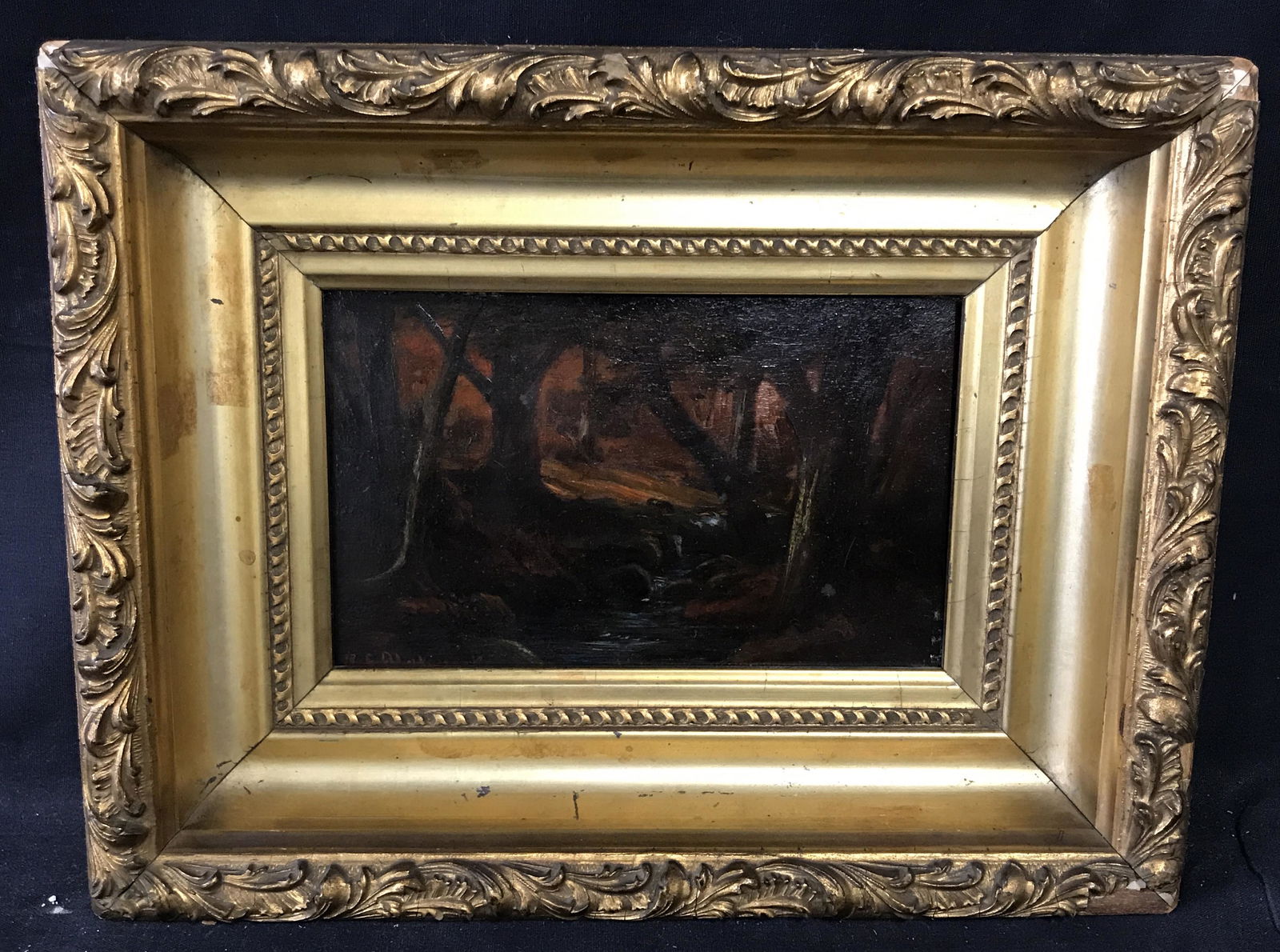 R.A. Blakelock Signed Oil on Panel c.1898: Ralph Albert Blakelock signed oil on panel, signature and date to the lower left corner reads Â‘R.A. Blakelock 1898Â’, subject a landscape of a forest in deep earthy colors, hand carved gilt woo