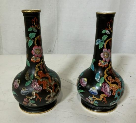 Pair Japanese Vases: Pair Japanese vases with brightly colored floral and vegetal designs, Inscription to base of one vase possibly reads ‘4’, rim and base of vases painted gold, both measure 3 1/2 inches in diameter,
