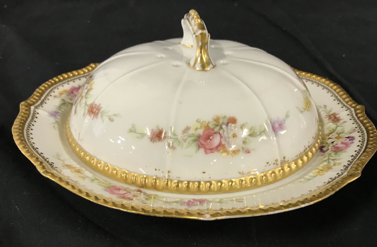 Lot 2 LIMOGES Hand Painted Porcelain Plates: Lot 2 vintage Limoges plates. Plates are hand painted with floral patterns, details in gilt paint. Largest piece measures approx 2.5 inches H, and 16 inches W. Undersides read as JP L FRANCE J. POUYAT