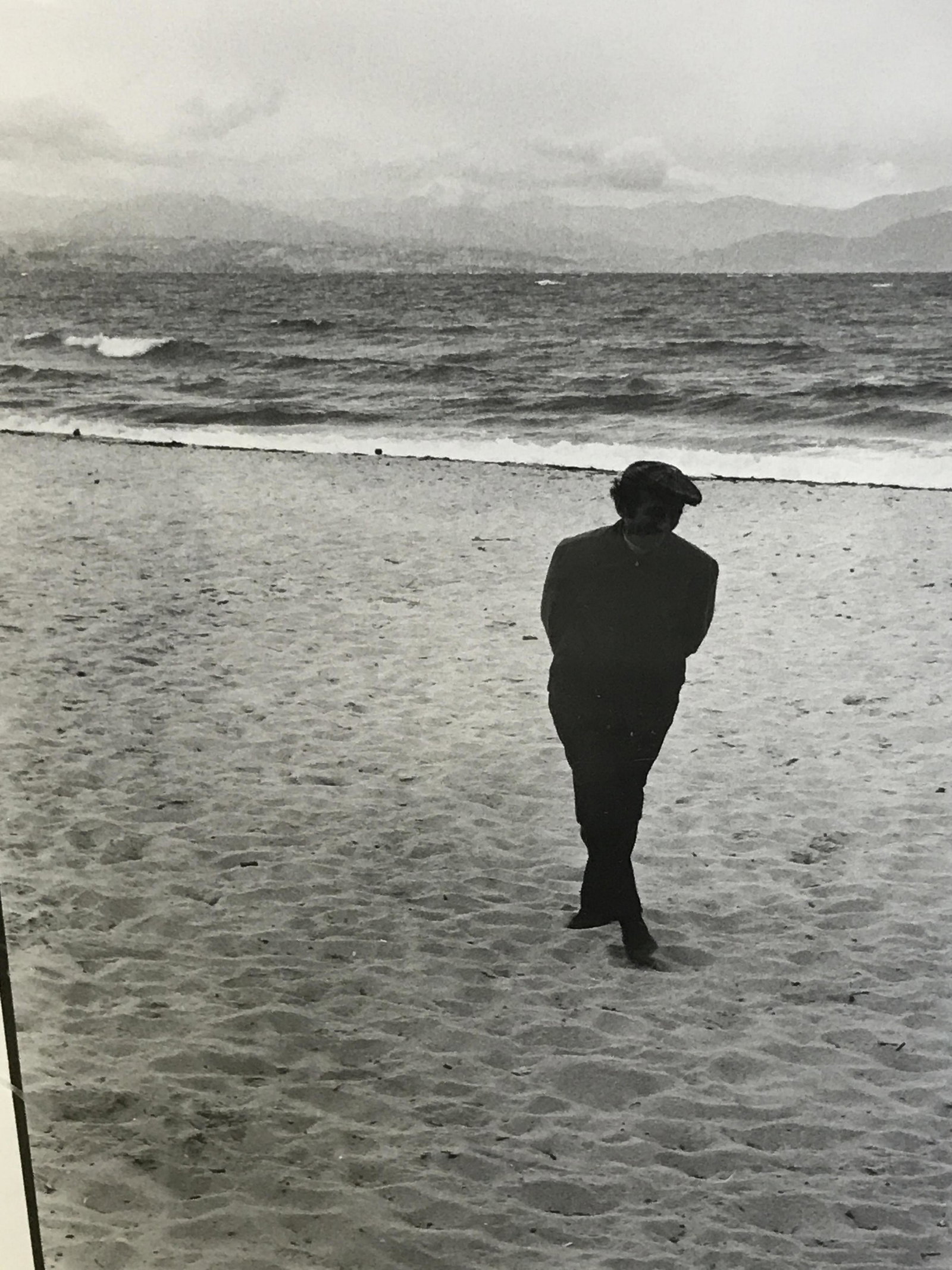 Michael Kaise Signed Photo of Man on Beach: Michael Kaise signed photo of man on beach, signature in the lower right corner reads Michael Kaise, subject a man on a beach in black and white, not properly placed in frame, professionally framed an