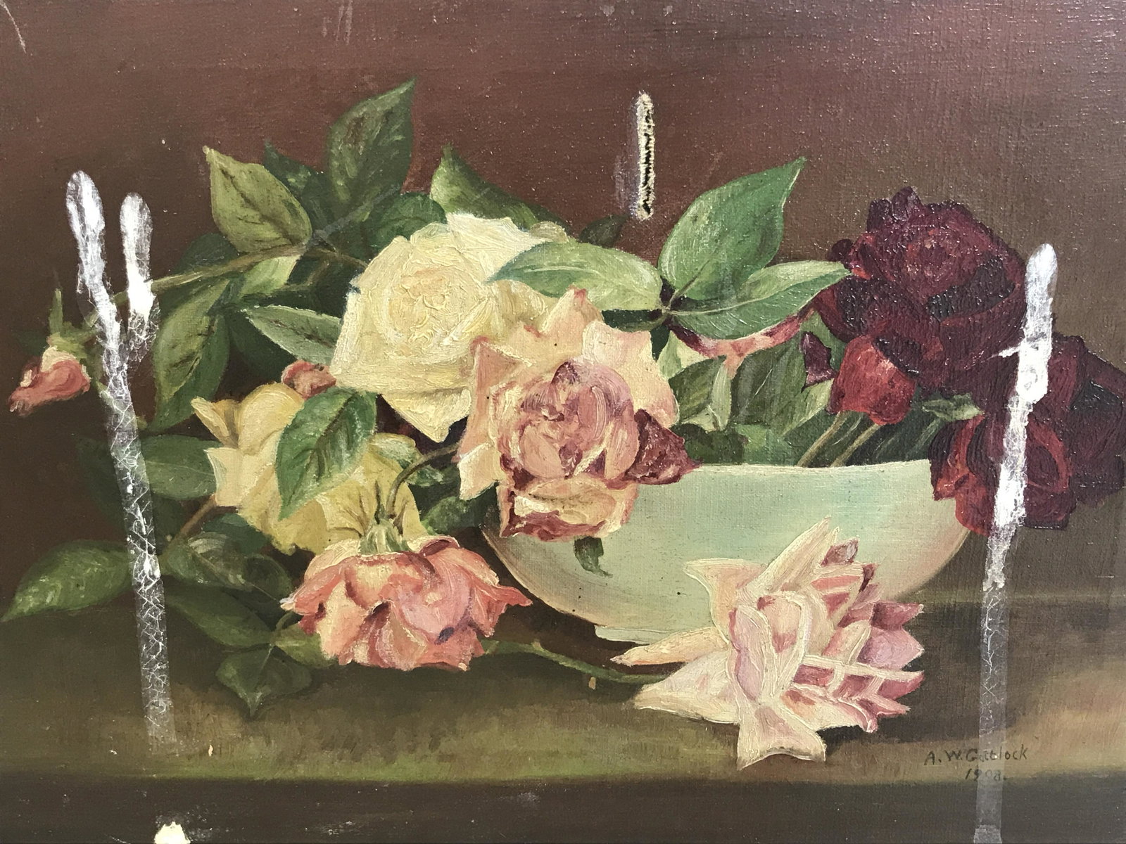 A.W.Gottlock Signed Oil Painting Floral Still Life: A.W. Gottlock Signed oil painting on canvas, signature and date to the lower right corner reads ‘A.W.Gottluck 1908’, subject a floral still life of multi colored roses in a bowl on a brown backgro