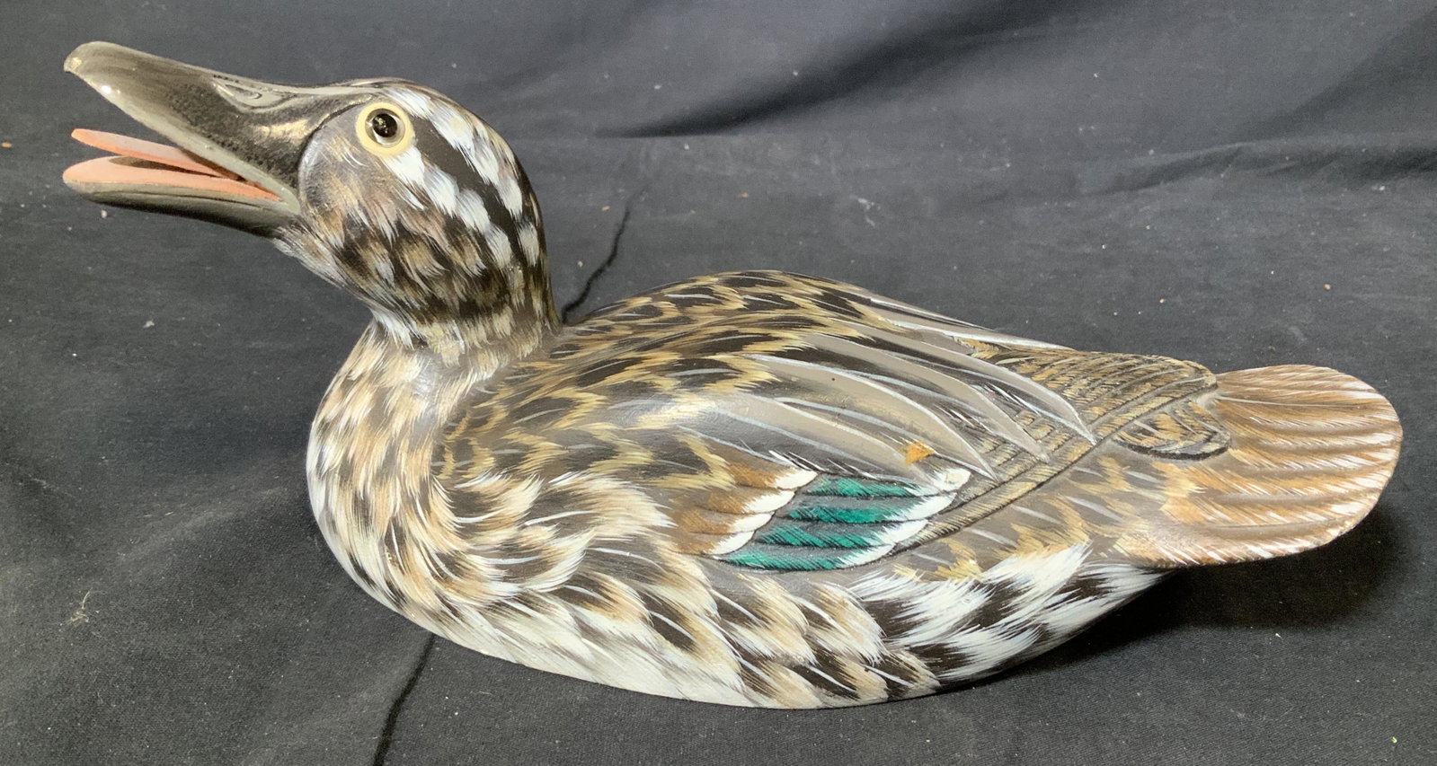 Hand Painted Wooden Duck Sculpture: Hand painted wooden duck sculpture, label to base reads ‘Garganey(F) Hand sculptured and hand painted’, has inlaid composite eyes and naturalistic carving of feathers, in great condition, measures