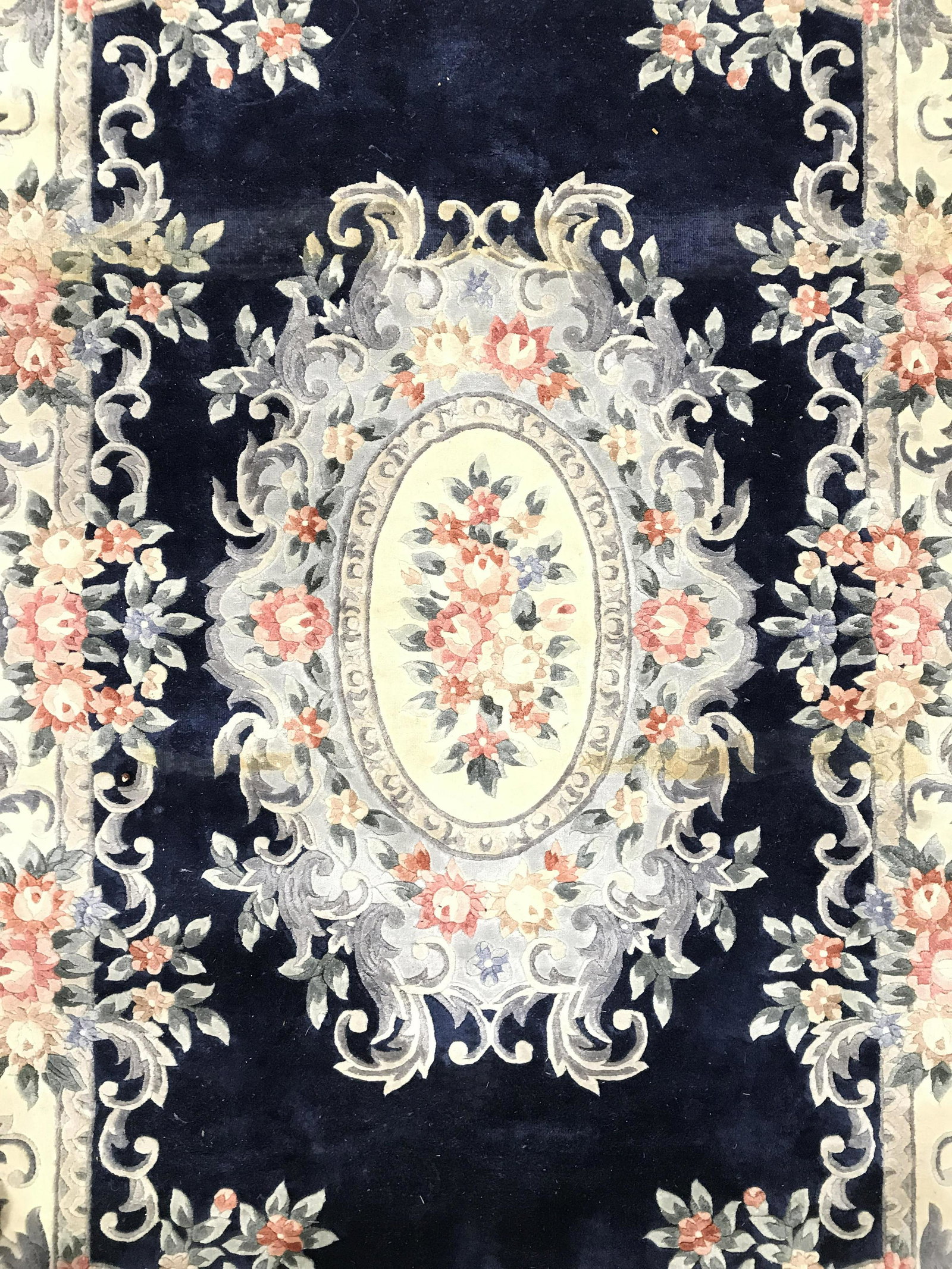 Vintage Wool Pile AUBUSSON Rug: Rug is wool pile and handmade. Piece contains intricate multi toned floral leaf c & s scroll detail. Rug is fringed. Piece measures approximately 104 inches long 61 inches wide. Rug, carpet, area rug,