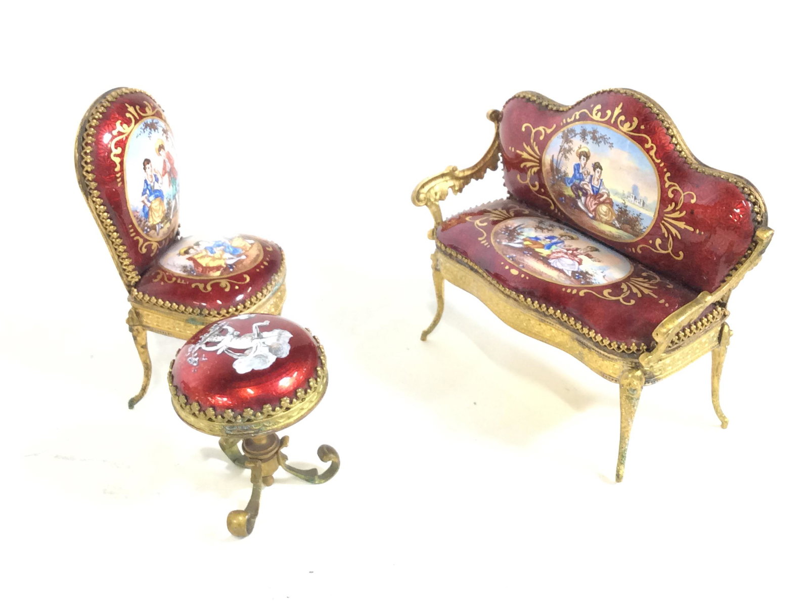 Set 5 Antique VIENNESE Enamel Miniature Furniture: Antique Austrian Viennese Enamel & Brass Miniature Furniture. All hand painted Enamel with man/woman romantic courting scenes and cherub. Set includes Pair of high back chairs, side table, lounge sett