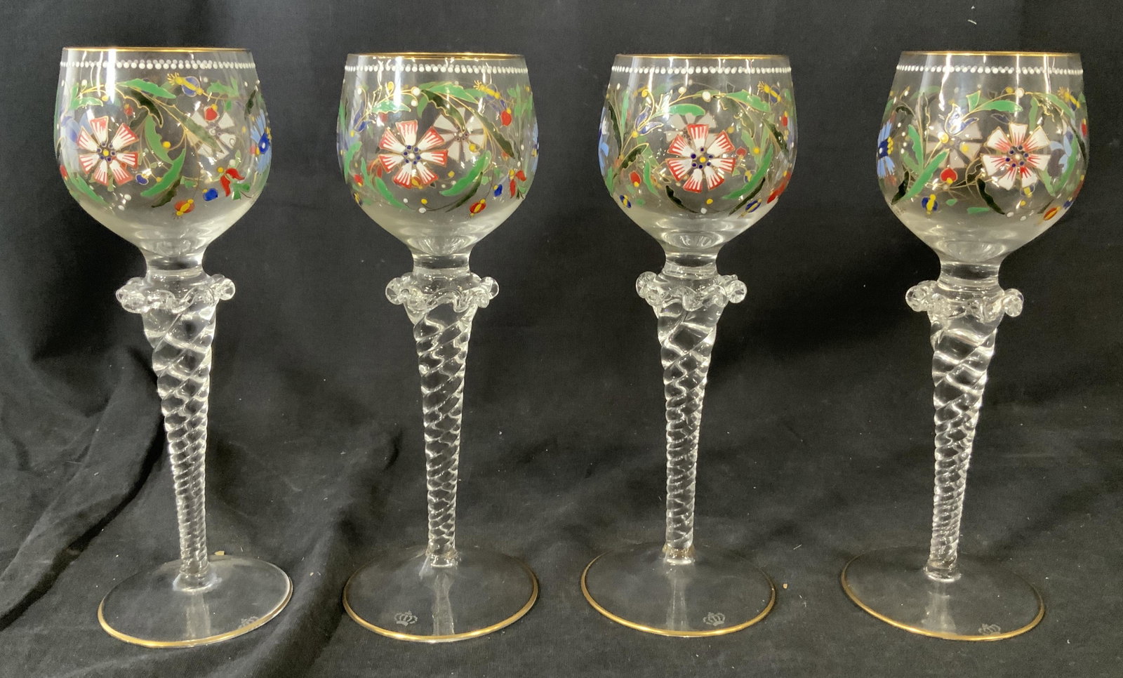 Set Theresienthal Crystal Wine Glasses: Set Theresienthal crystal wine glasses, crown shaped stamp etched into base of all glasses, hand enameled with floral design, decorative stem, in good condition, all measure 2 1/2 inches in diameter, 