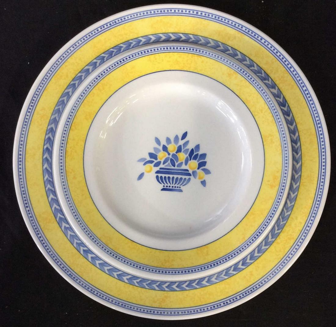 Johnson Brothers Porcelain Dinnerware Sets, England: 14 pcs total. Set 6 dinner plates, 10.25 in. & set 8 luncheon/salad plates, 7.5 in. All Hallmarked on verso. Beautiful blue laurel and yellow decor on white porcelain. Pattern Jardiniere. Designed by