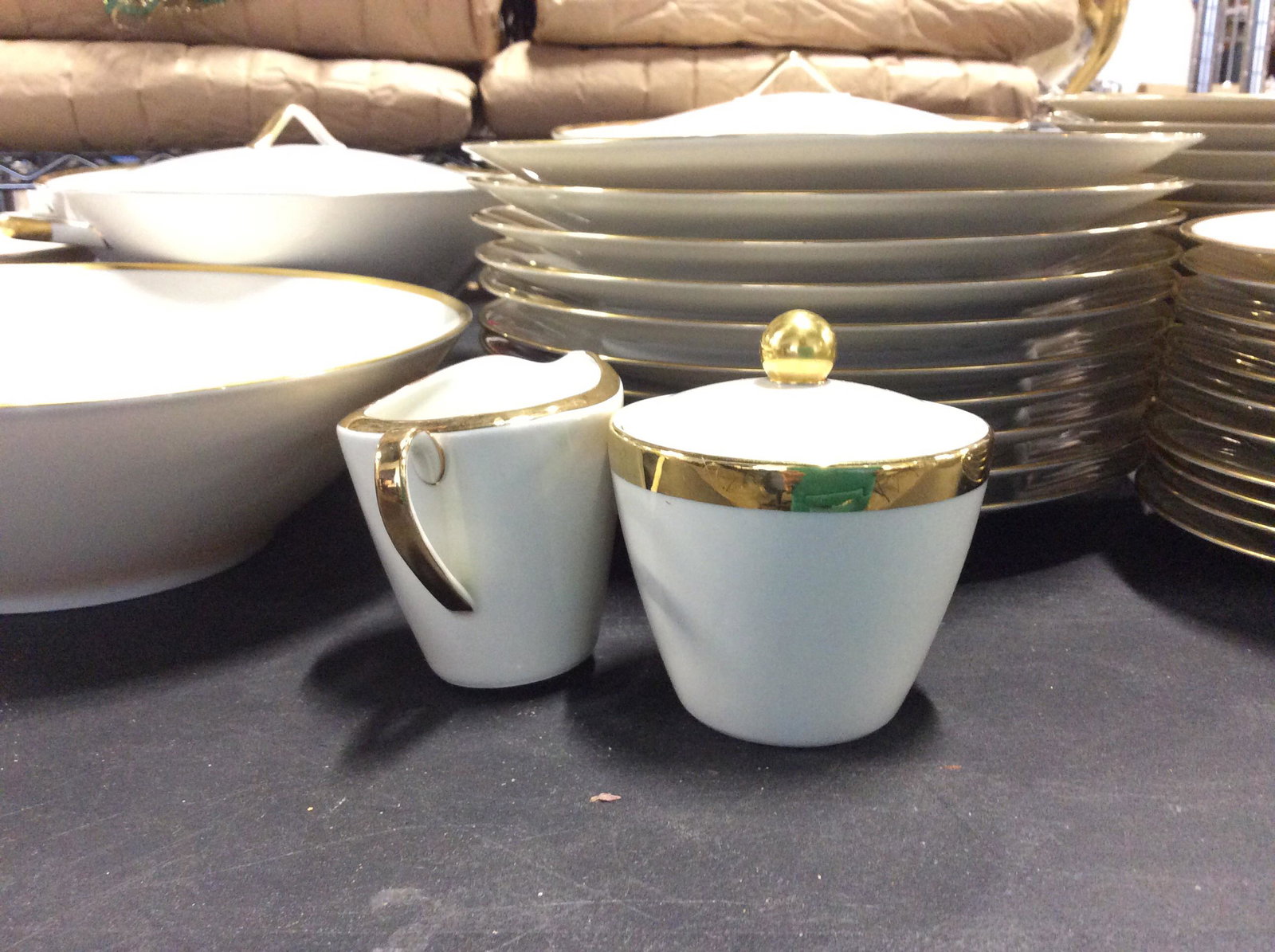 Two Sets Chinaware, Noritake & Johann Leltmann: Similar Sets of Cream Colored China Table Ware with Gilted Rims.Huge Lot Of dinner plates, soup bowls, Lidded serving bowls, more. All Hallmarked. Noritake ‘Dignato’ # 7523. 2 Lidded Serving Bowls