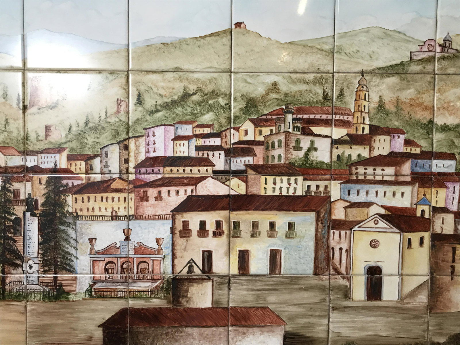 Tuscany Hand Painted and Signed Tile Mural: Tuscany Hand Painted and signed tile Mural, signature and text in Italian in the lower right corner, emblem and text to the lower left corner reads ‘Citta Di Sala Consilina’, tag residue to upper 