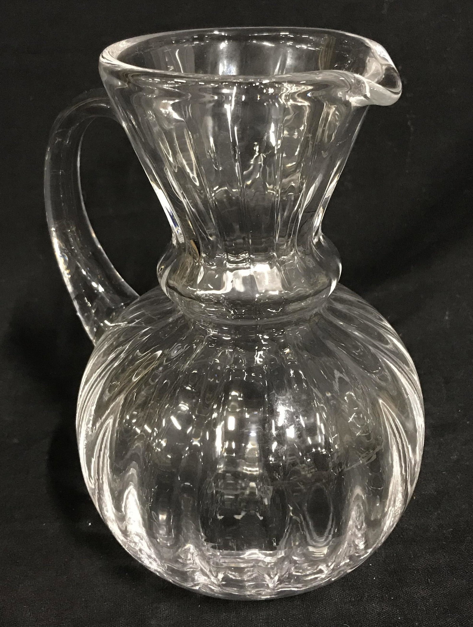 Vintage FLAMANT Glass Pitcher: FLAMANT Glass pitcher, possibly vintage. Handblown glass pitcher, signed FLAMANT. Measures approx 7.5 inches H, and 6.25 inches W. Wear is consistent with age and use. Dinnerware, home decor, Glasswar