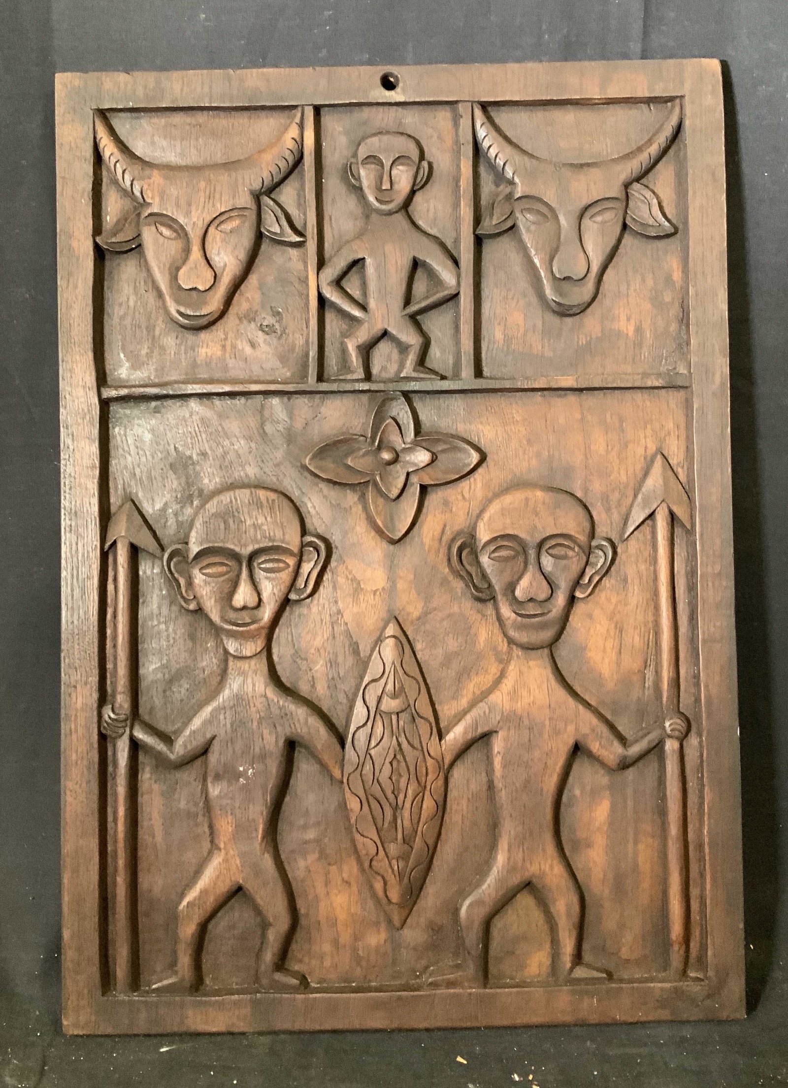 Tribal Wooden Relief Panel: Tribal Wooden Relief Panel, possibly African, no apparent signatures or inscriptions, sticker to reverse un removed to preserve piece, two figures holding spears and shields, two oxen and another figu