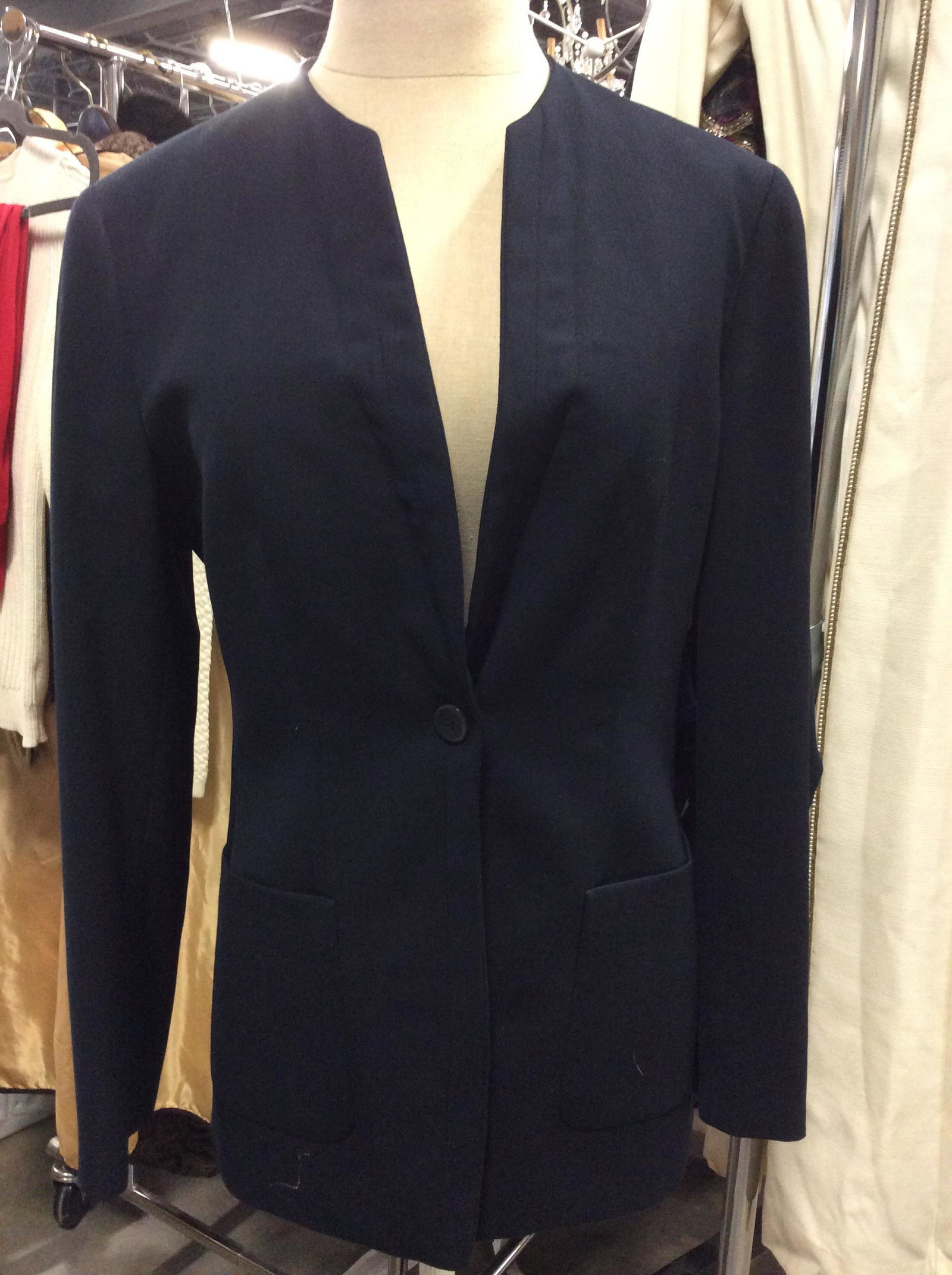 Luxury Navy ARMANI Wool Skirt Suit, Italy: Includes Giorgio Armani Felt Hanger. Italian Designer, Blazer And Skirt In Navy Blue, Wool , both pieces lined in Rayon. Label reads Wool and both have Armani Designer labels that reads GEORGIO ARMANI