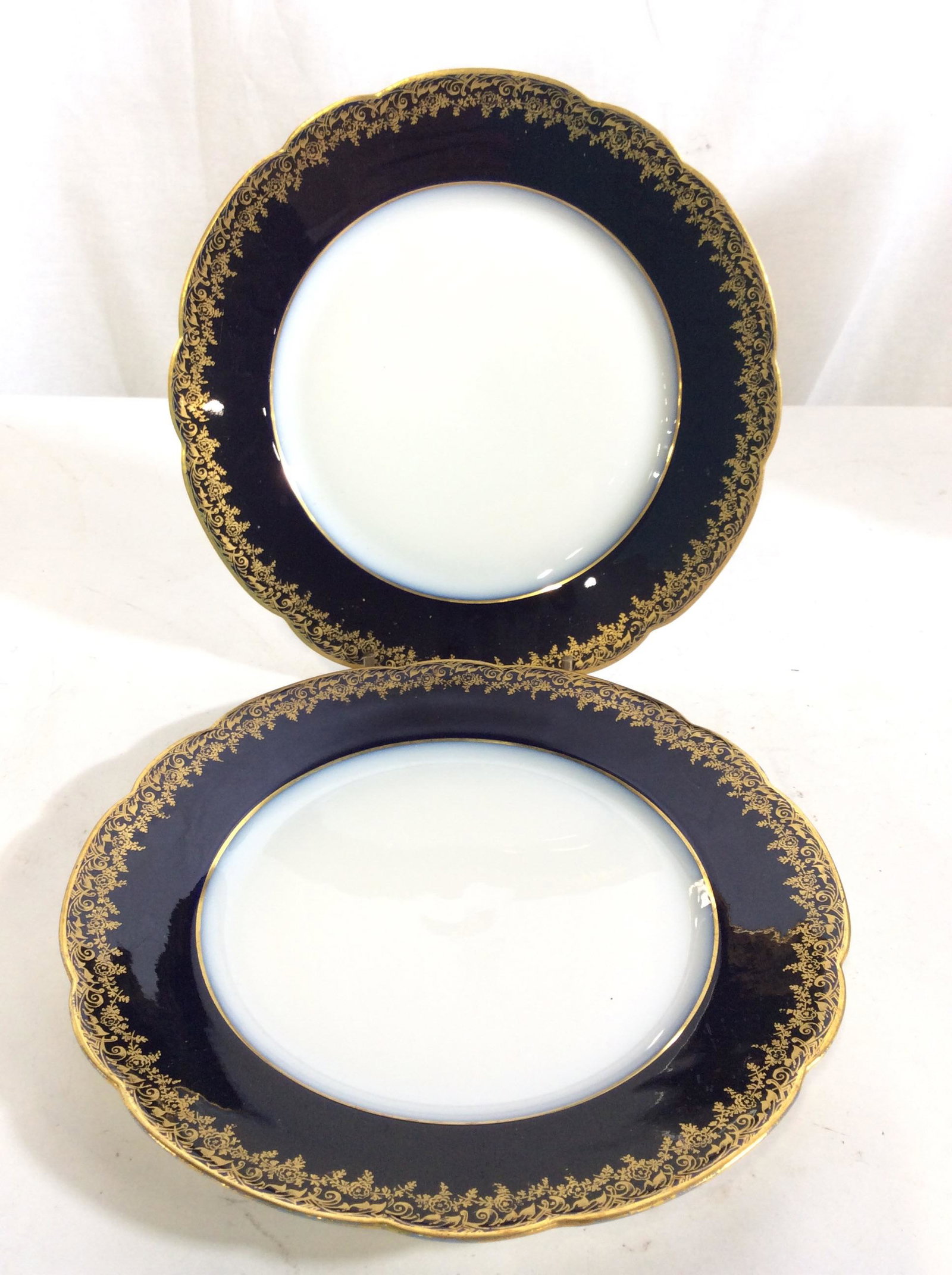 JP LIMOGES France Luncheon Plates, France: 8 plates total. Vintage scalloped rim plated, cobalt blue border with intricate Gilt work. White porcelain center. Measure 8.5 in. Hallmarked on underside with multi marks, includes organs ink stamp r