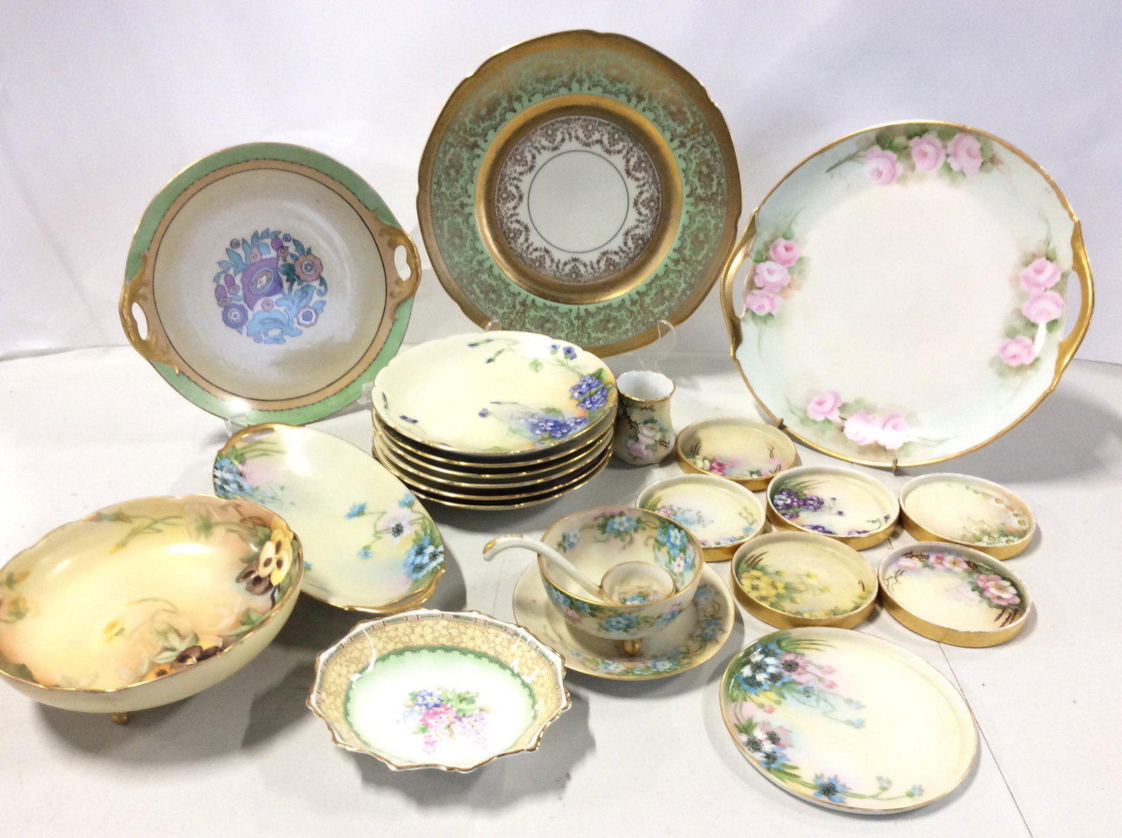 Set Signed Antique European Porcelain Dishes: Bavarian And Limoges France & Goa Limoges & Nippon porcelain pieces hand painted from the consignor’s aunt who lived in Europe and may have worked for Limoges. Appear to be antique. Signed ‘Suess�