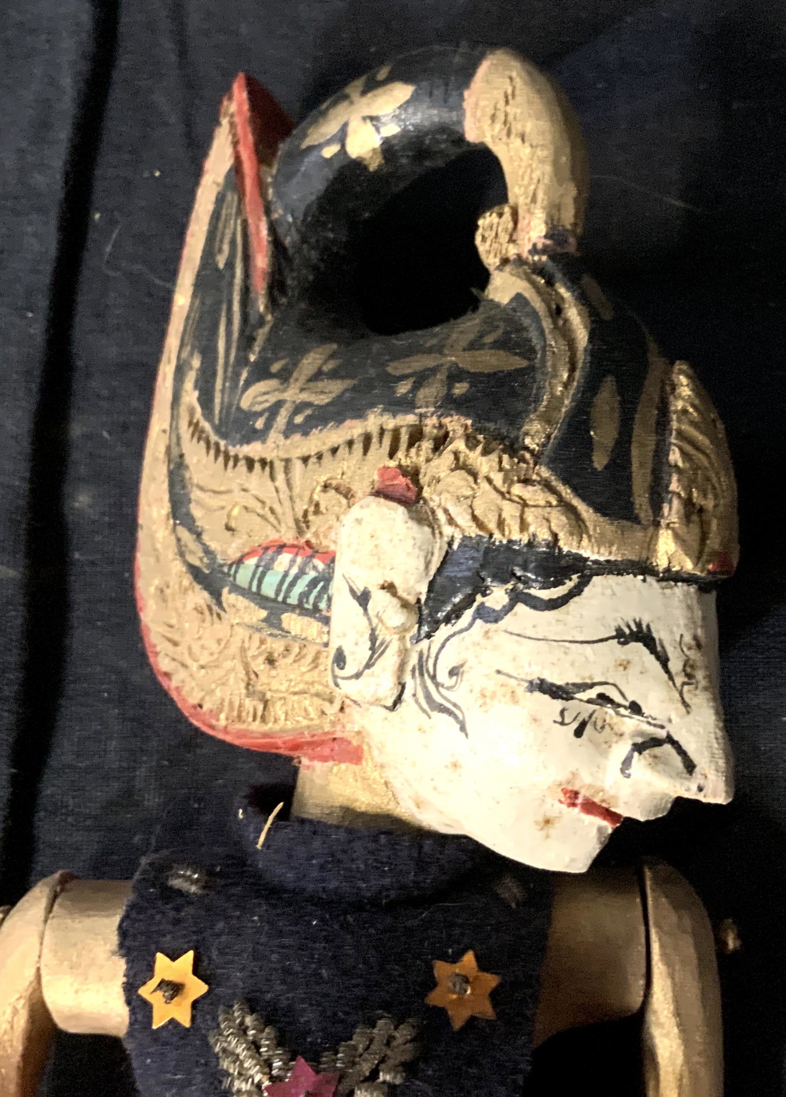 Far East Asian Hand Carved Puppet: Far East Asian Hand carved puppet, possibly Thai, label to clothes reads ‘Pantjawala’, Has movable arms attached to sticks, hand carved and painted, wearing traditional clothing, elaborate headdre