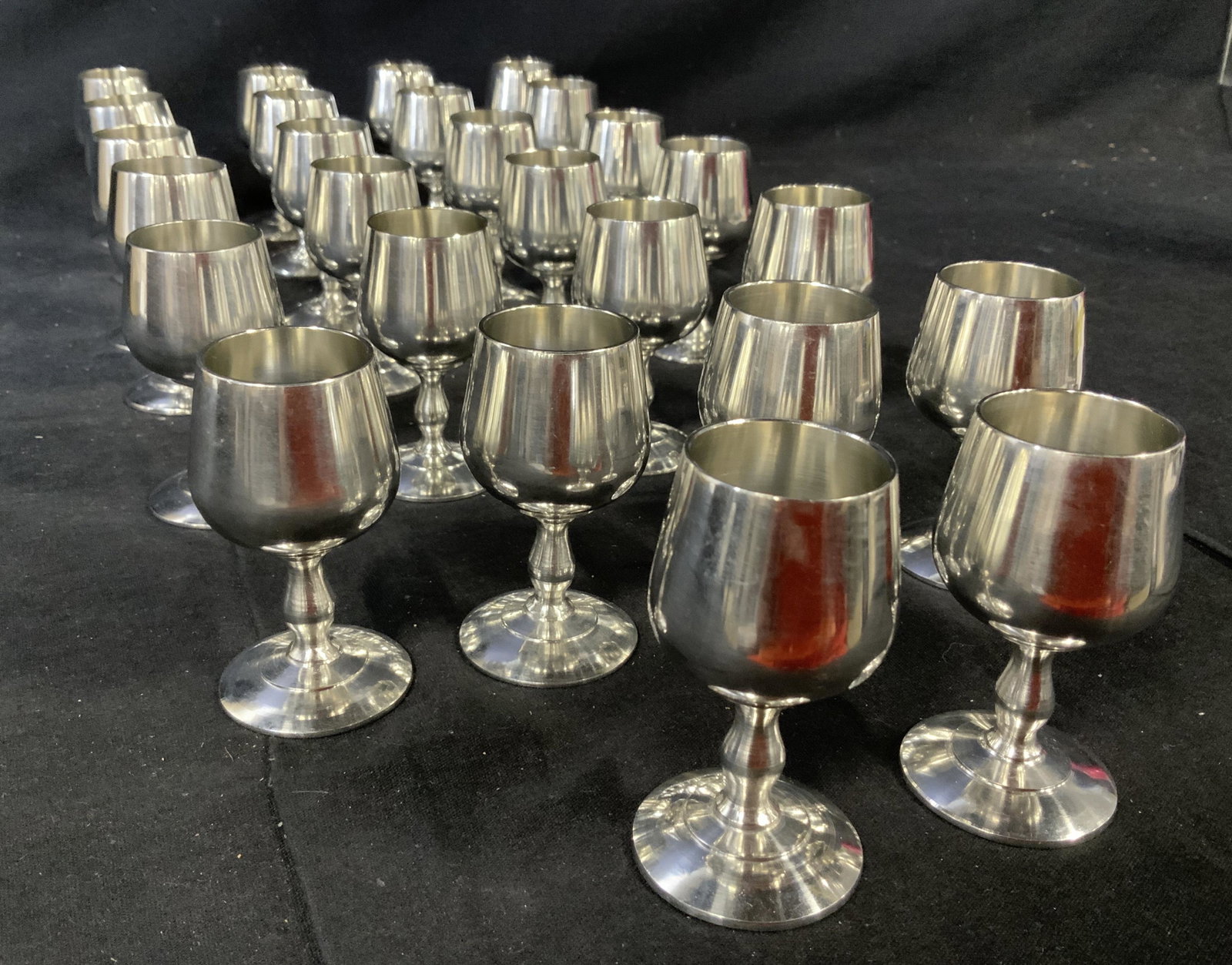 Lot 26 Bankatin Indonesia Miniature Goblets: Lot 26 Bankatin Indonesia Miniature Goblets, inscription to base reads ‘kerajinan bankatin indonesia’, silver toned metal, all measure 3 1/8 x 1 5/8 inches in diameter, in good condition, Property