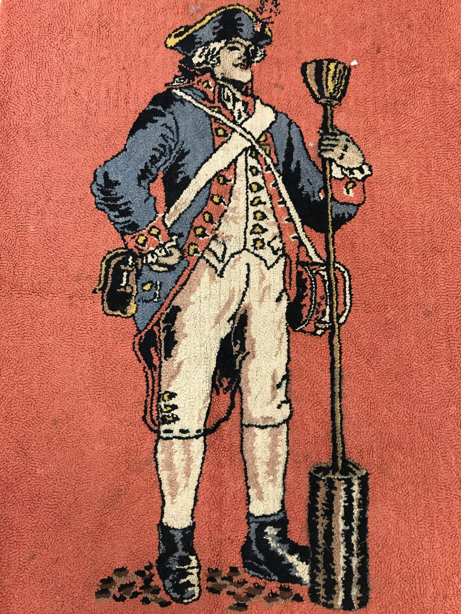 Vintage Continental Army Soldier Motif Rug: Vintage area rug, depicts a continental soldier, reads ARTILLERYMAN CONTINENTAL ARMY. Wear is consistent with age and use. Measures approx 38 inches long, and 28.25 inches W. Vintage carpet, vintage w