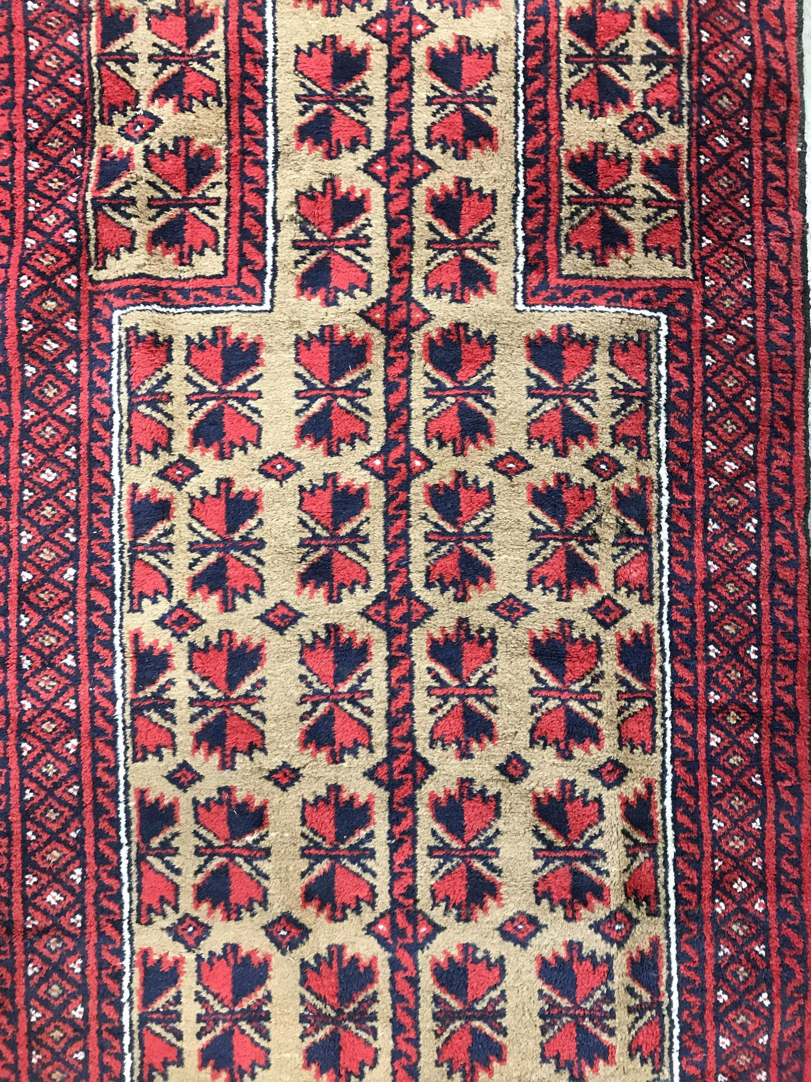 Vintage Caucasian Style Handmade Wool Rug: Rug is wool and handmade. Piece has Caucasian style. Rug contains multi toned geometric detail. Rug is fringed. Piece measures approximately 58 inches long 33 inches wide. Rug, carpet, area rug, wool 