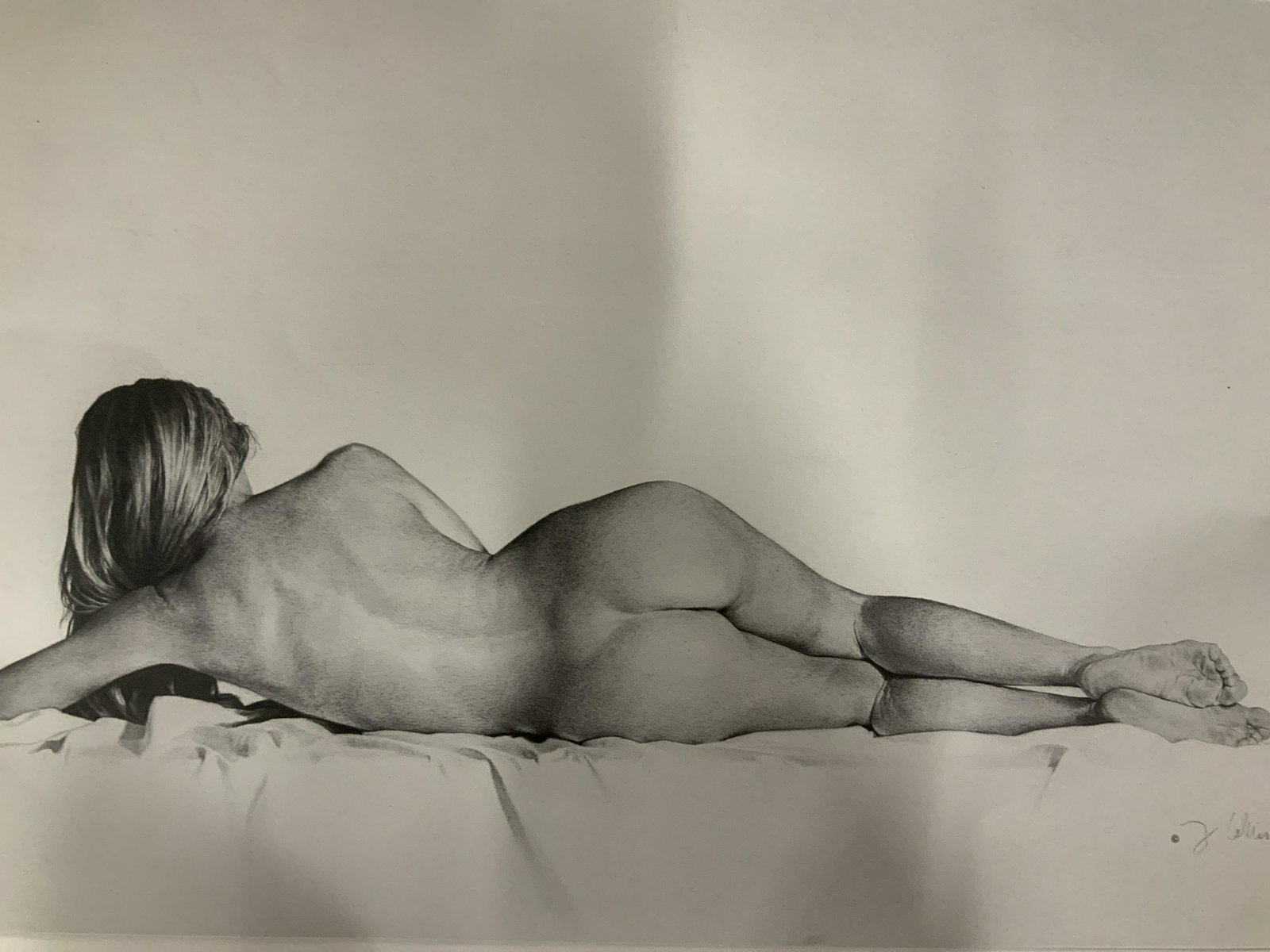 Female Nude Offset Lithograph: Female Nude Offset Lithograph, signature printed to lower right illegible, inscription to lower left reads ‘Copyright The Cambridge Group Ltd 1990’, a reclining nude woman, measures 16 x 21 7/8 in