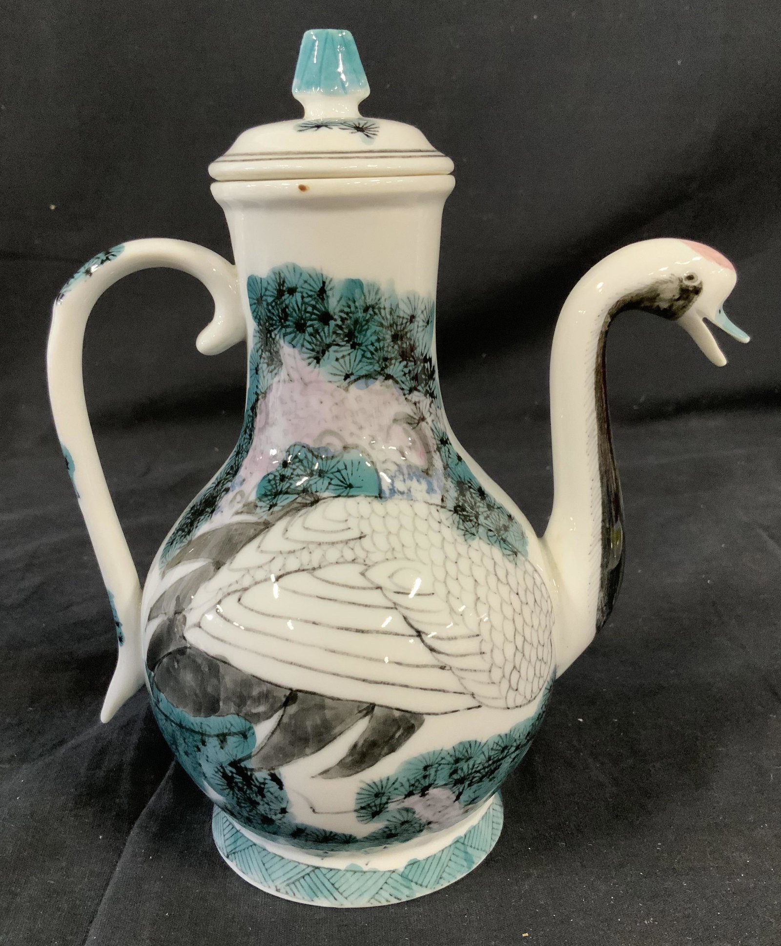 Chinese Swan Figural Ceramic Teapot: Chinese Swan ceramic Teapot, inscription to life in Chinese characters, spout shaped like swan, hand painted design to body of teapot, measures 8 inches tall x 7 inches at widest point, in great condi