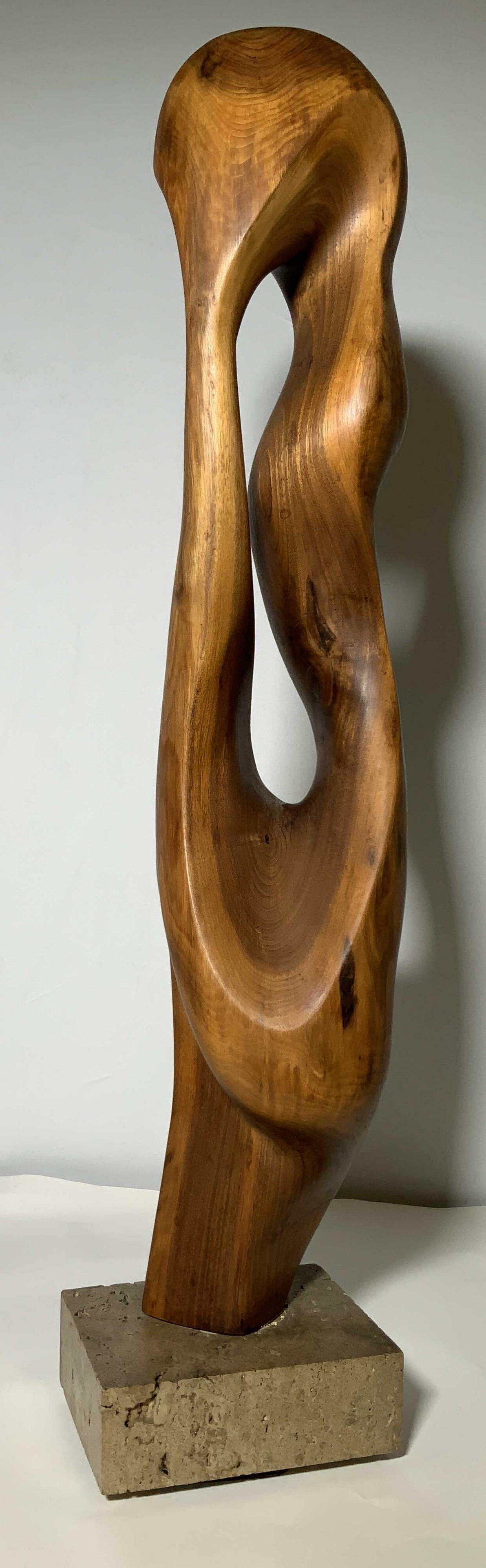 Modernist Carved Wood Biomorphic Sculpture: Fine art, sculpture, home decor, A vintage modernist biomorphic style carved wood sculpture mounted on a travertine marble base with a rotating metal support. This sculpture appears to be unsigned. Th