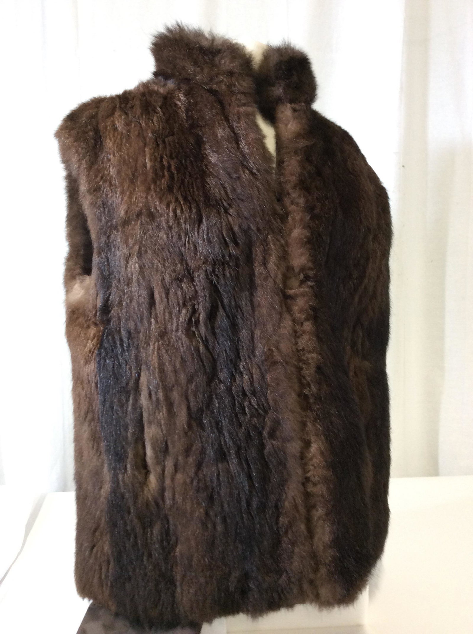 Reversible Rain/Winter Fur Coat & Vest: Multi use coat , sleeves button off to wear as a vest, Authentic Fur one side ( as a vest or as a jacket). Other side rain jacket with long sleeves and warm interior fur around body. App 26 in long. S