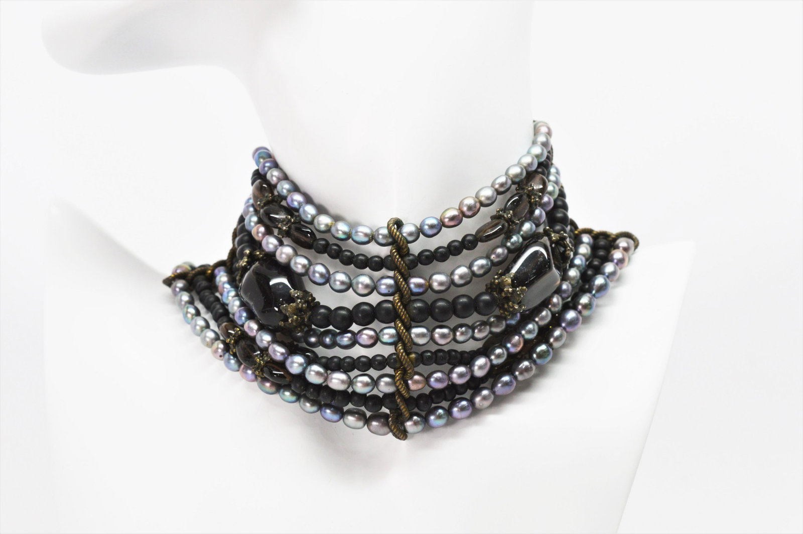 Maya Evangelista Statement Choker Necklace: Vintage Artfully done by designer Maya Evangelista. This circa 1980's necklace is an eclectic mix of black stone, iridescent gray blue pearls and ak amber glass beads that make stunning statement as a