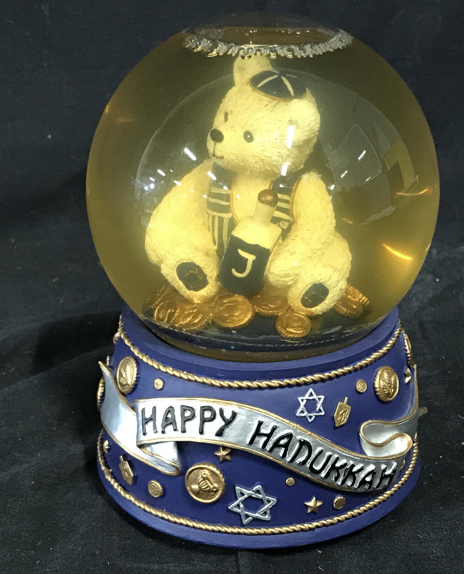 Happy Hanukkah Teddy Bear Snow Globe: Happy Hanukkah Teddy Bear Snow Globe, text to globe reads ‘Happy Hanukkah’, text to underside reads ‘Made in China’, label to underside reads ‘For decorative use only not intended for use by