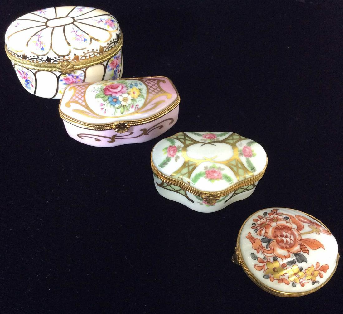 Lot 4 Vntg Limoges & Handarbeit Trinket Boxes: Hand painted Gilt Lidded Trinket Porcelain Boxes. Brass Detailed Hardware, hinged lids, multiple floral designs. Largest Trinket box measures 3 x 2 in. Ht 1.5 in. All Hallmarked on underside. Chamart 