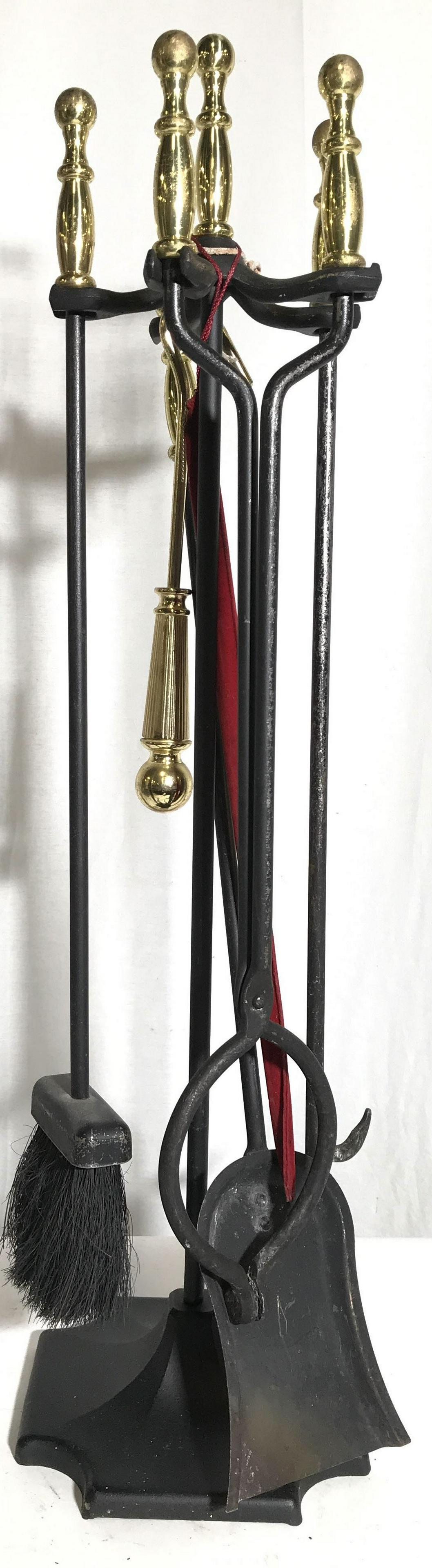 Set 5 Vintage Metal Fireplace Tools W Stand: Lot includes 1 shovel, 1 broom, 1 stand, 1 set of tongs, 1 poker. Tops of tools are gold toned and appear to be brass. Stand measures approximately 32 inches tall 8 inches wide and deep. Fireplace too