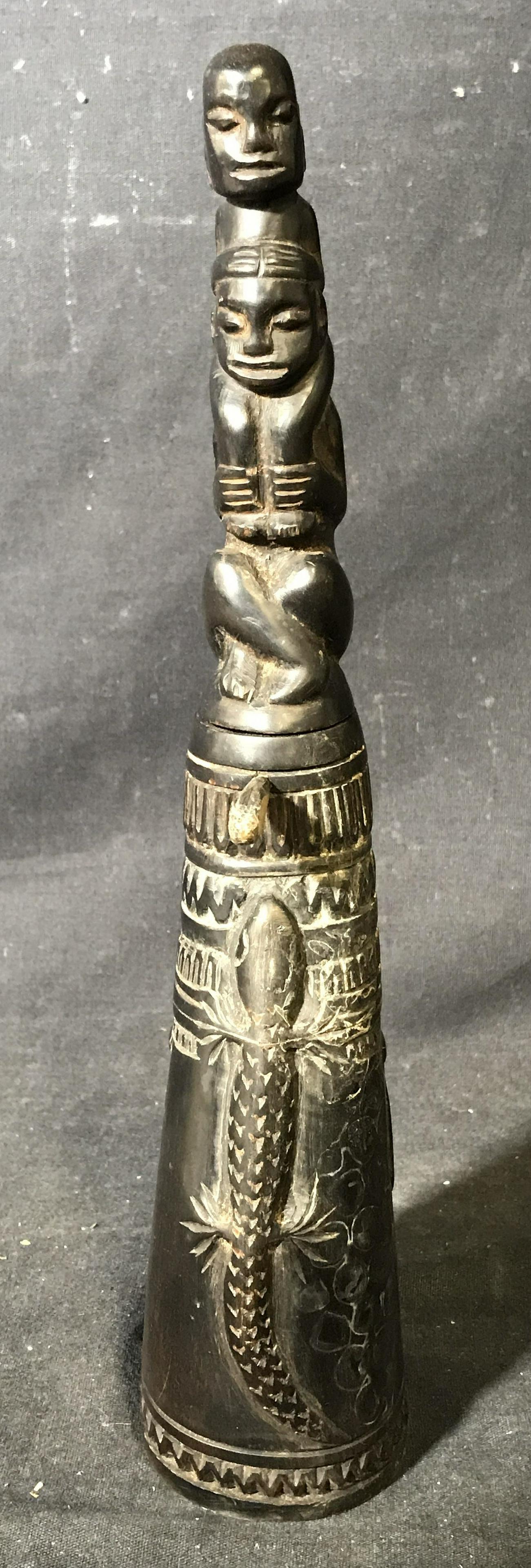 Far East Asian Wooden Statue: Far East Asian wooden statue, resembles a totem pole with an enlarged base, base has lizard and snake designs to it, top has two figure stacked on each other, top section of statue detached and is rea