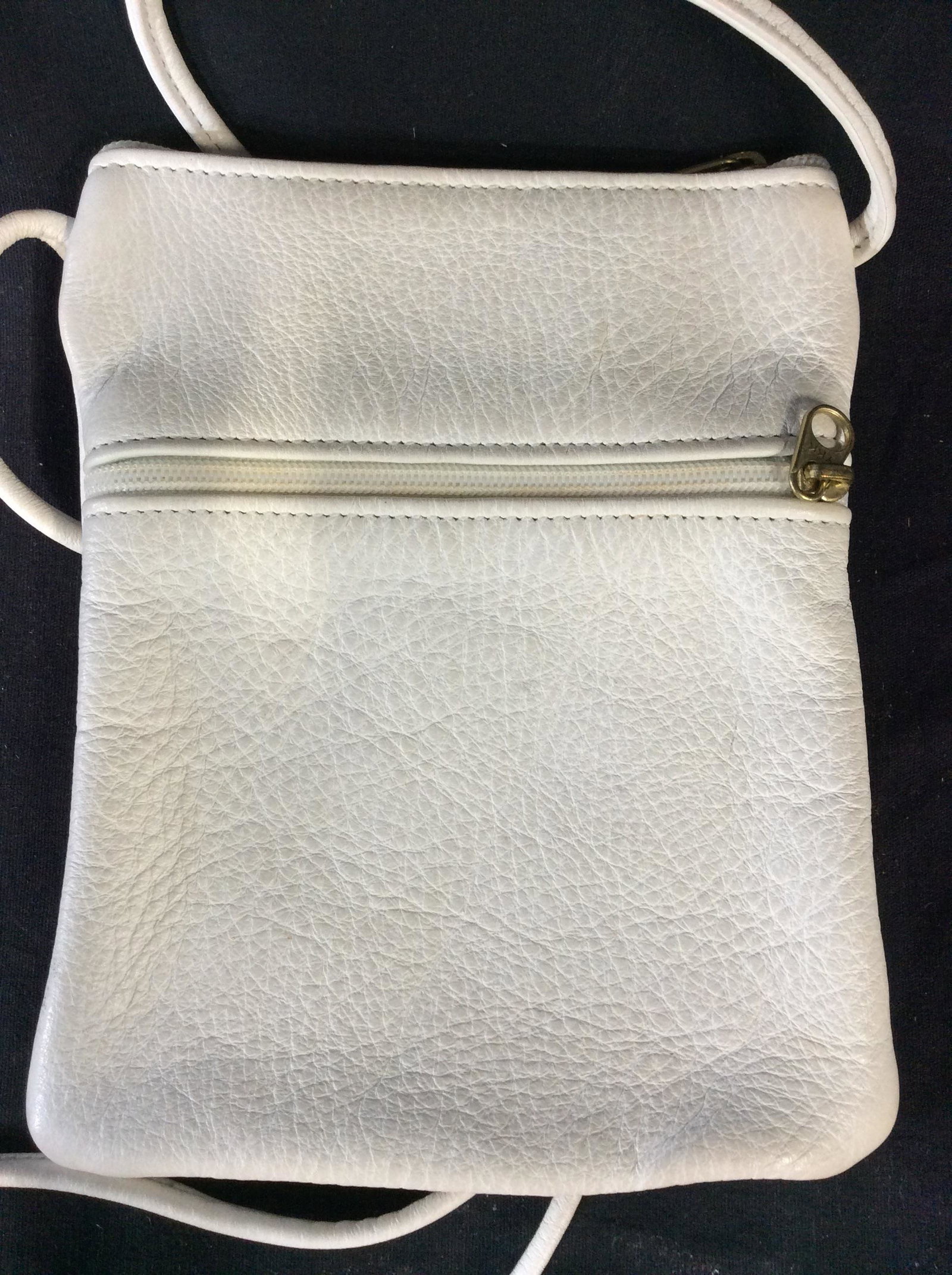 White Leather Cross Bag Pouch, Vintage: All leather, interior suede. Zipper closure, 22 in strap drop, YKK on zipper hardware, 7.5 x 5.5 Pouch size. Vintage Bag Purse Pouch, White Leather, Cross Shoulder Bag, Weekend Excursion Accessory, YK