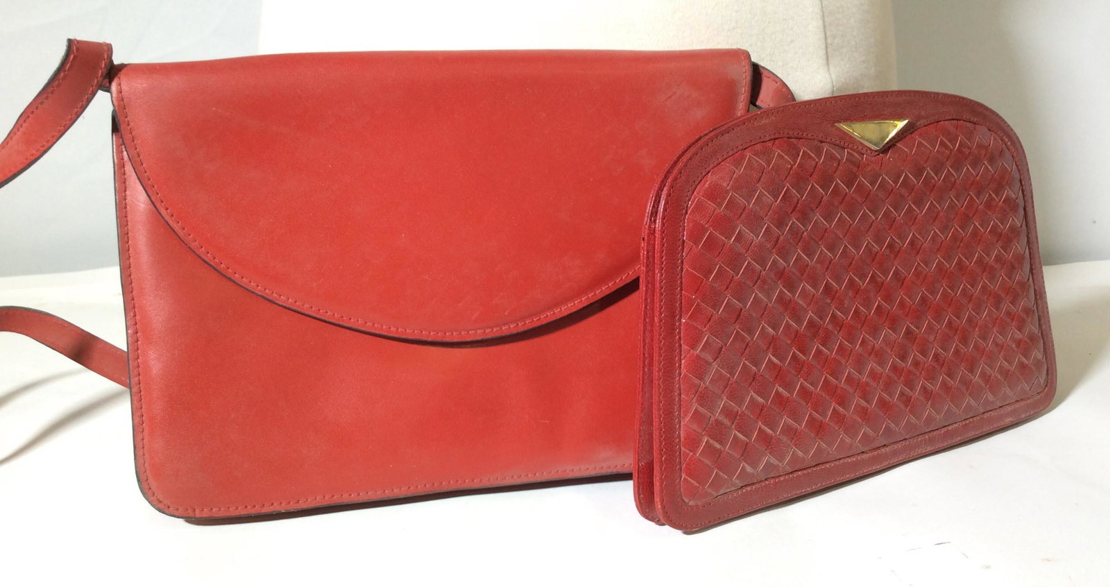 Lot 2 Italian Red Leather Designer Clutch, Purse: red purse labeled on interior for Italpel, Red Leather Shoulder Bag, converts into a clutch. Soft leather, strap drop 15.5 in. Bag measures 10 x 7 in. Interior black leather. Fold over snap. Good vint