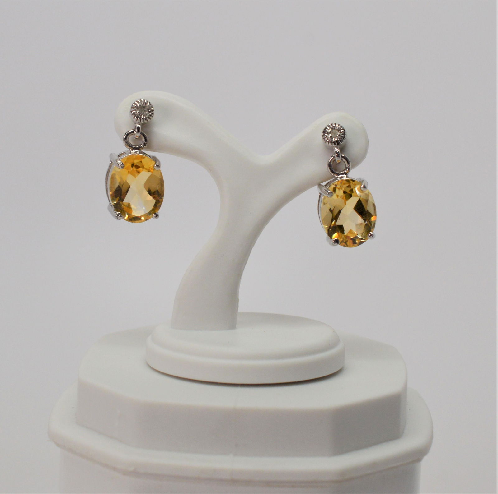 Sterling Silver/Citrine & CZ Drop Pierced Earrings: 1/2" long. Citrine Stones in .925 sterling silver with CZ accents for pierced ears, made in Thailand; 2.2TW