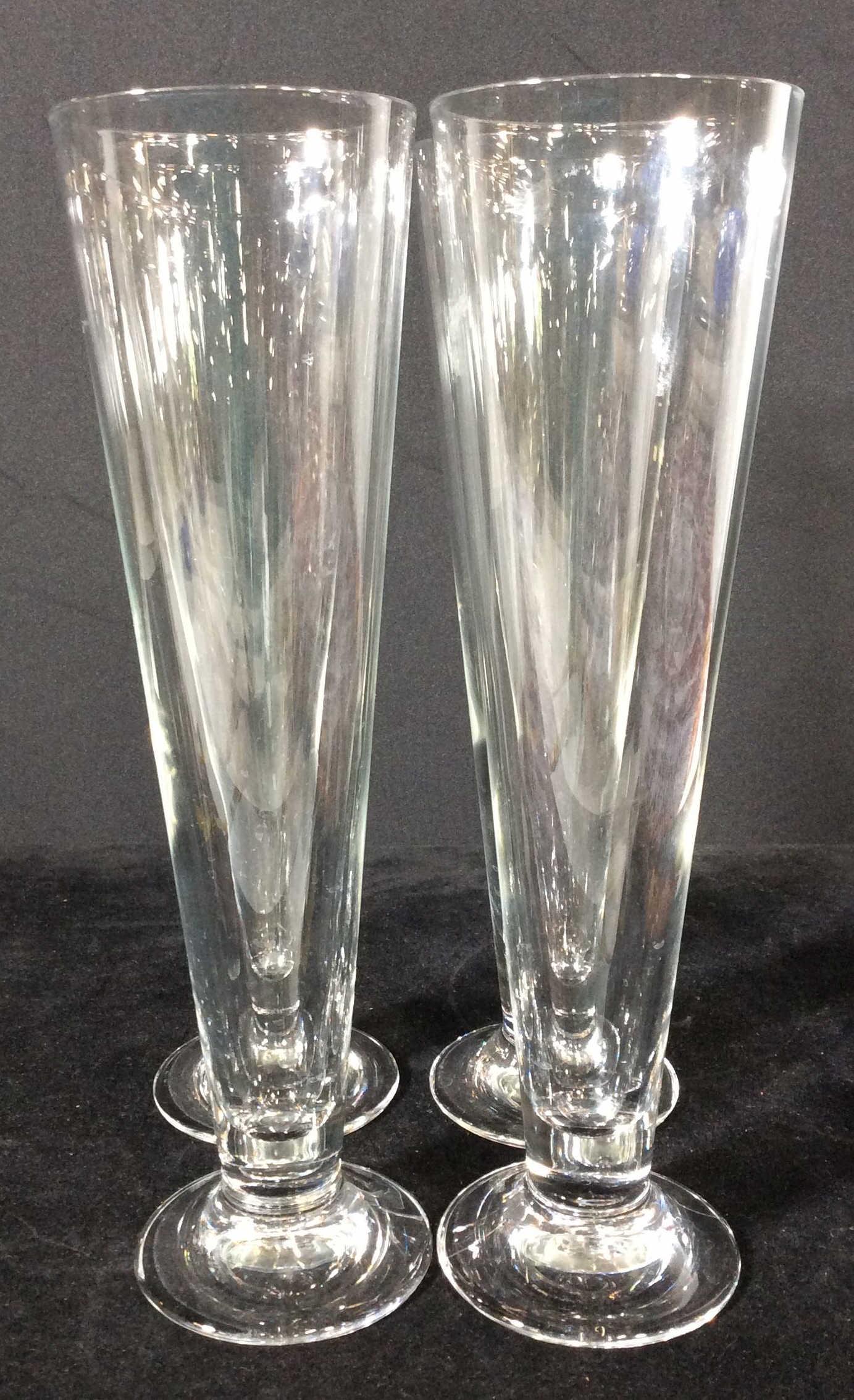 Set 4 Pilsner Beer Crystal Glasses, Italy: 11 in. Tall, 3 in. Diameter. no issues noted. Made in Italy, underside reads Italy. Barware, Crystal Ware, Beer Glasses, Crystal Pilsner Glasses, Tabletop, Draft Beer Glasses, Pilsner Glasses, Italian
