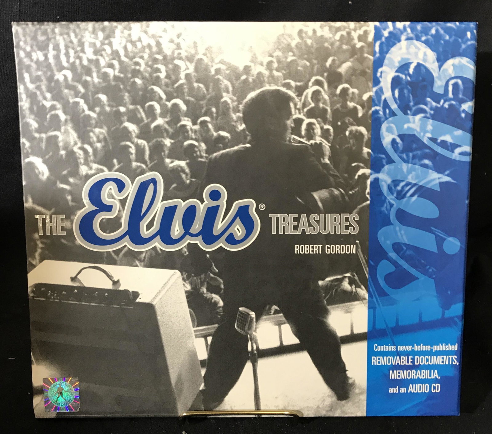 THE ELVIS TREASURES Collectible Elvis Memorabilia: Collectible Elvis memorabilia. THE ELVIS TREASURES by ROBERT GORDON, includes an audio cd, removable documents, and memorabilia. Book has a protective cardboard case. Measures approx 11 inches H, and 