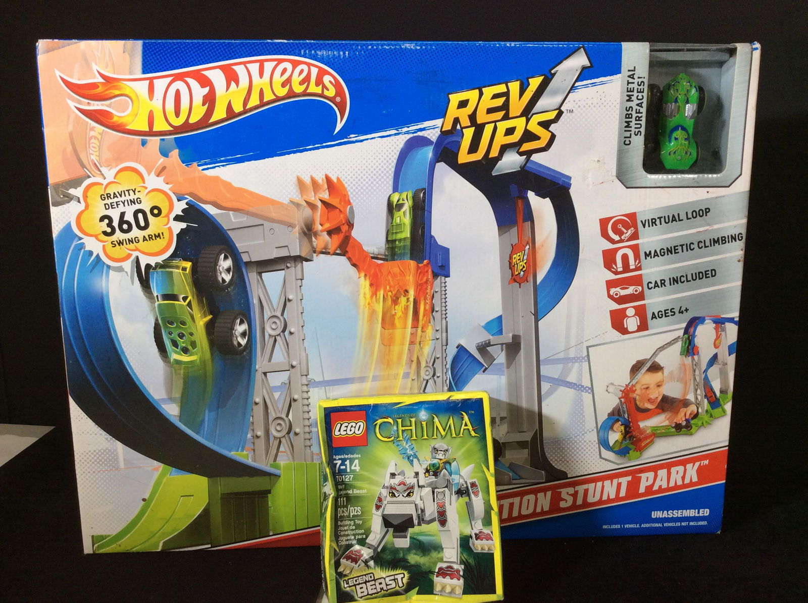 Hot Wheels and Legos Toys, NIB: Lego Chima Building Toy. # 70127, Wolf Legend Beast. In box, never opened. Hot Wheels Revolution Stunt Park with Car, rave loop, magnetic climbing action. Box Never opened. Box measures 20 x 15 in. Ne