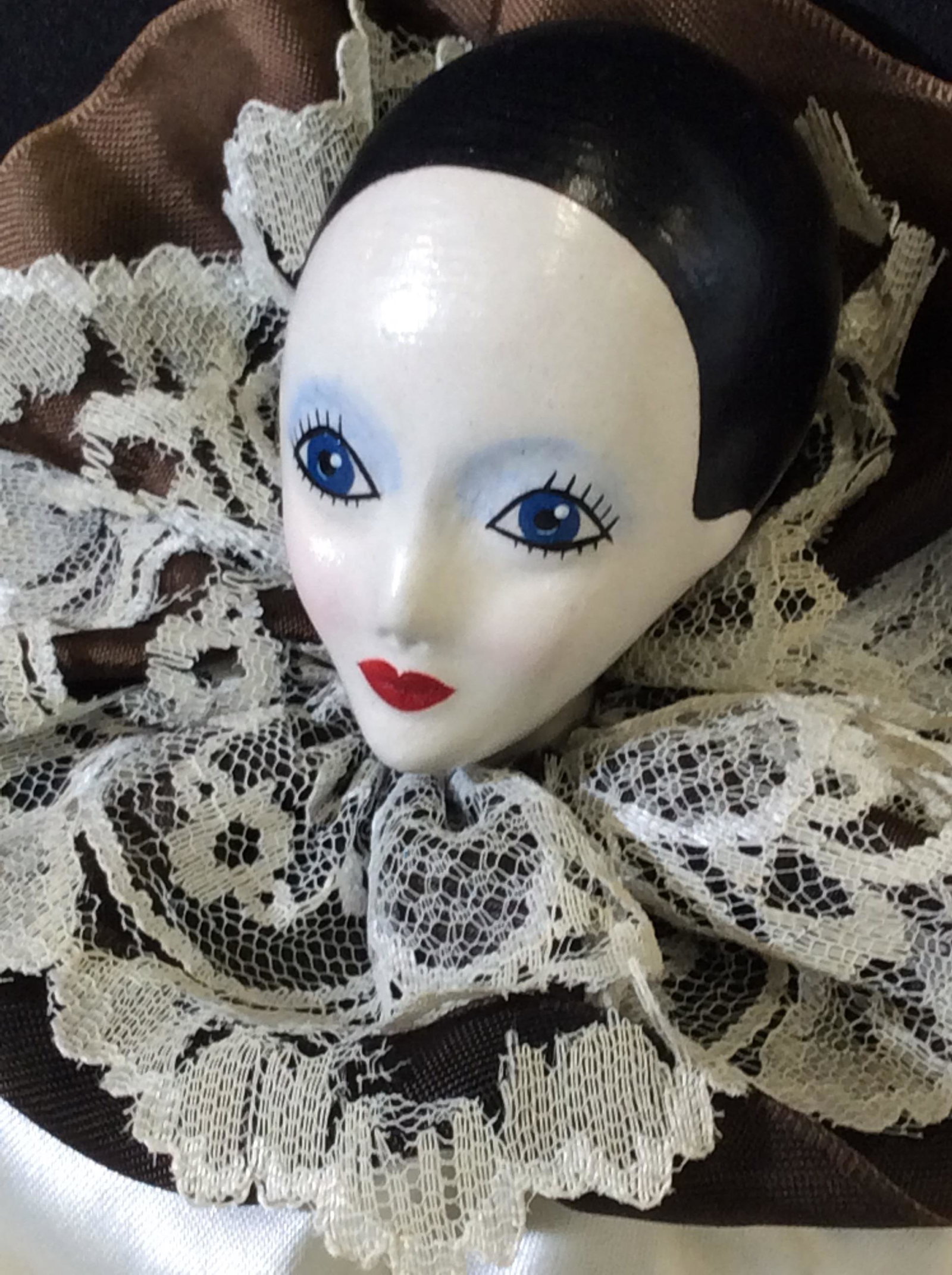 Collectible Hand Painted Harlequin Doll: Vintage Dolls, face, hands and legs hand painted, possibly wood composite, 19 in ht, 7.5 in width. Stains on back of fabric, rips to fabric on legs. Woman Figural Harlequin Doll, Hand Painted Harlequi