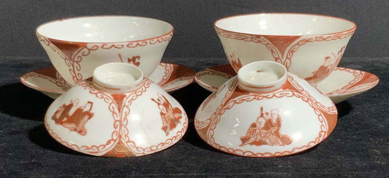 Vintage Asian Tea Set, Hand Signed & Painted: Set 6, Vintage Asian Tea Set that has been hand painted over glaze. Scenes on the Asian ceramics depict couples sitting. Overall colors are white and red. Minor chips and surface crack due to age. Not
