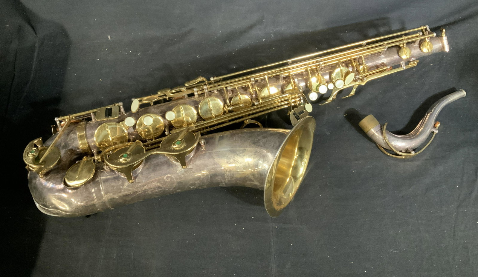 Jean Baptiste Saxophone: Jean Baptiste Saxophone, inscription to saxophone reads ‘Jean Baptiste’, ‘Life Sciences Secondary School #02’, ‘355647’, ‘JB900TS’, ‘JB’, label to interior of case reads ‘100% Co