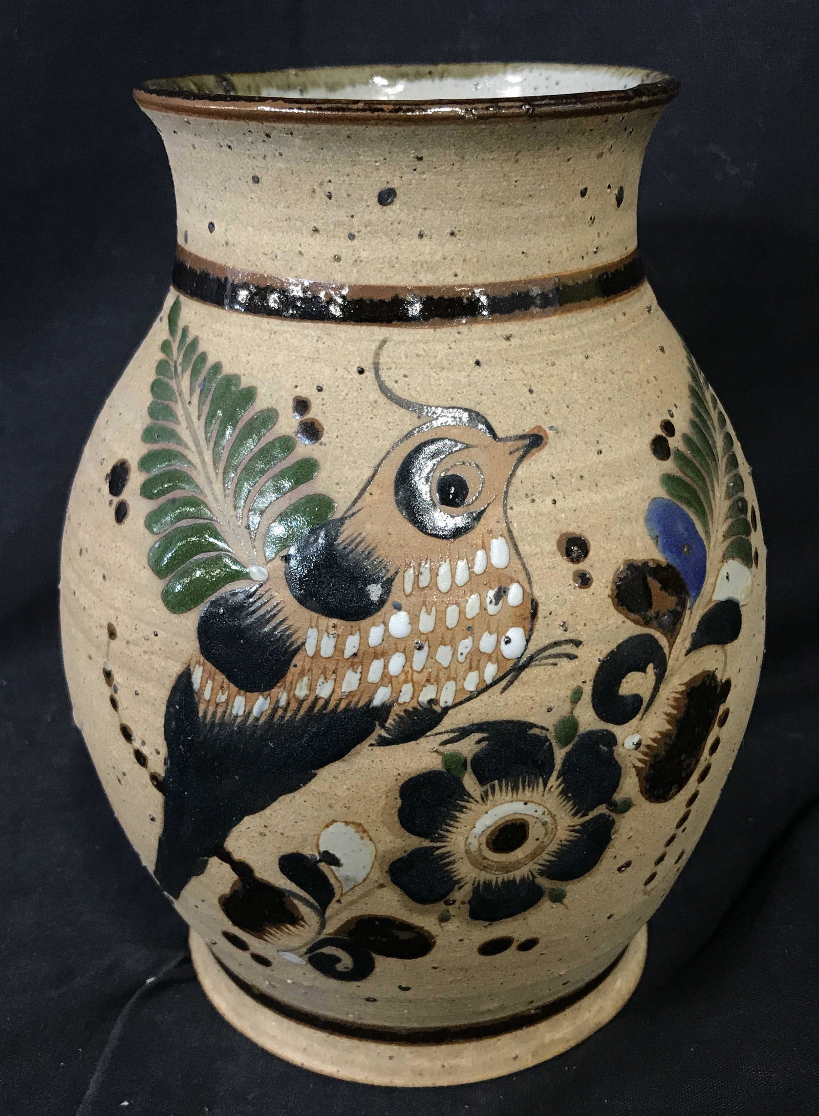 Vintage Hand Painted Earthenware Vase: Vintage earthenware vase. Depicts a bird among flowering plants. Measures approx 8.5 inches H, and 7 inches W. Underside reads as NS or SN. Wear is consistent with age and use. Earthenware, Terra Cott