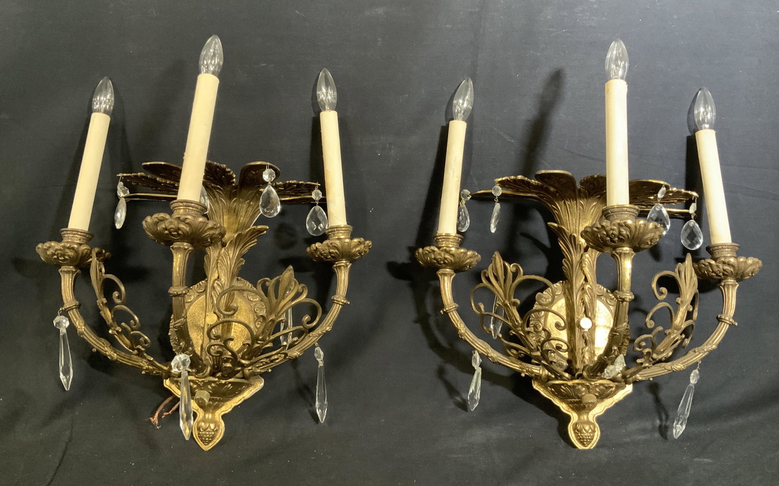 Pair Leviton Rococo Style Wall Sconces: Pair Leviton Rococo Style Wall Sconces, possibly brass, inscription to sconce reads ‘Leviton 3A-125V 1A-250 V IA-125 VT’, has elaborate vegetal detail, some composite pendants have come off, both 