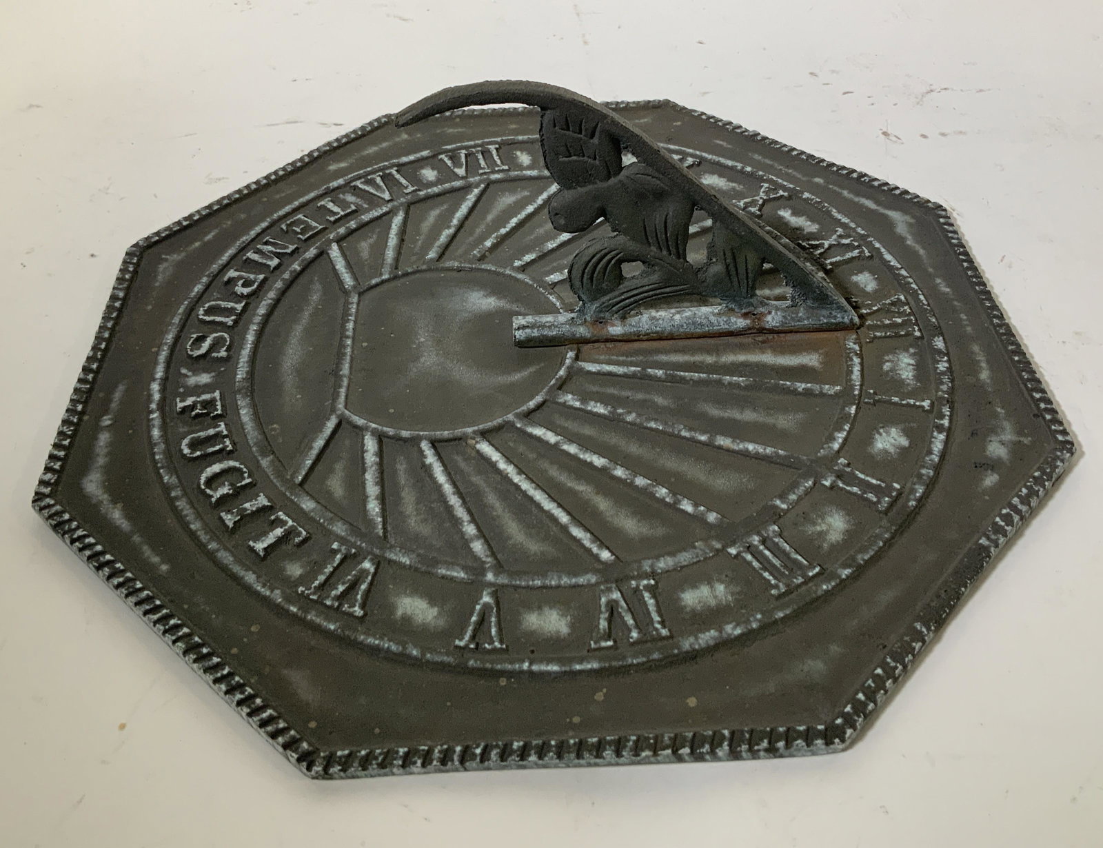 Metal "Tempus Fugit" Sundial: Metal Tempus Fugit Sundial, inscription to piece reads ‘Tempus Fugit’ as well as Roman numerals, Tempus fugit is a Latin phrase, usually translated into English as "time flies". measures 3 1/8 inc