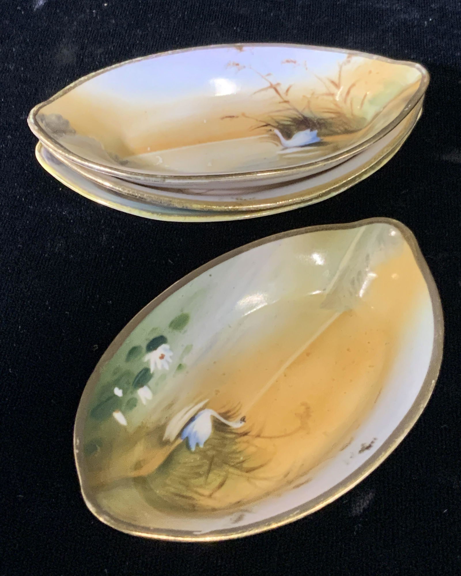 Set 4 Vintage NIPPON NORITAKE China Trinket Dishes: Set of 4 vintage hand painted NORITAKE tea bag holders/trinket dishes. Underside stamp reads: hand painted, Nippon, NORITAKE ‘M’ symbol in the center. The ‘M’ in the wreath symbol was used fro