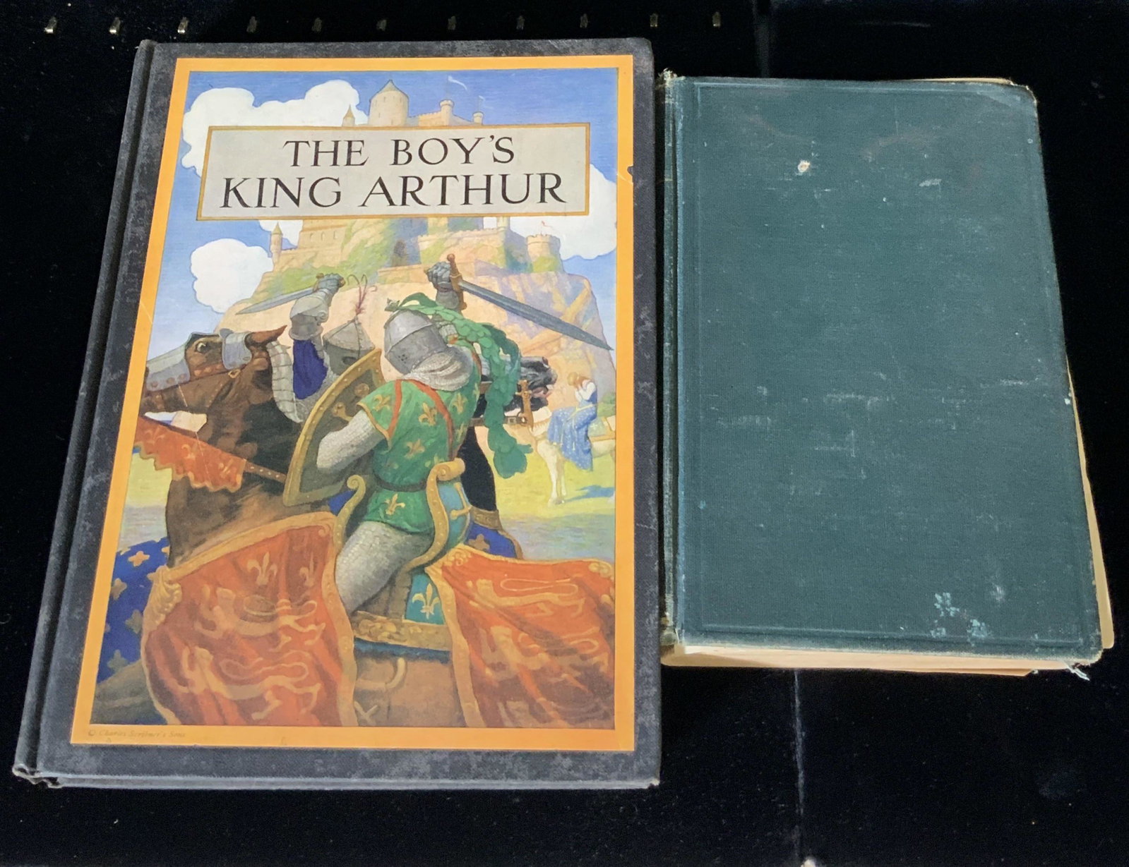 Lot of 2 Antique Decorative Novels: Lot of 2 antique decorative novels. Titles include: THE BOY’S KING ARTHUR & BLACK BEAUTY. Antique condition. BLACK BEAUTY has torn pages, not adhered to spine. 9.5 in. height. Width approx. 7.5 in. 