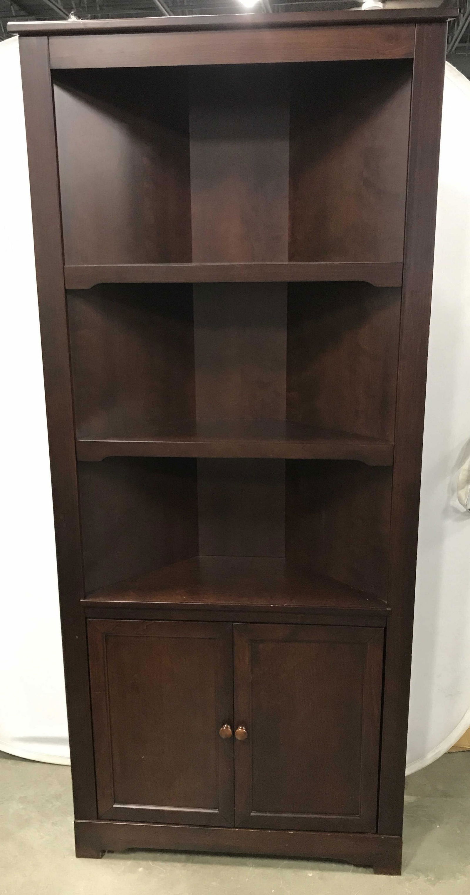 POTTERY BARN Wooden Display Shelves W Cabinet: Wooden display shelve, two doored cabinet. Cabinet seals with magnet, compartment houses and adjustable shelf. Measures approx 80 inches H, 34.25 inches W. Wear is consistent with use. Label on unders