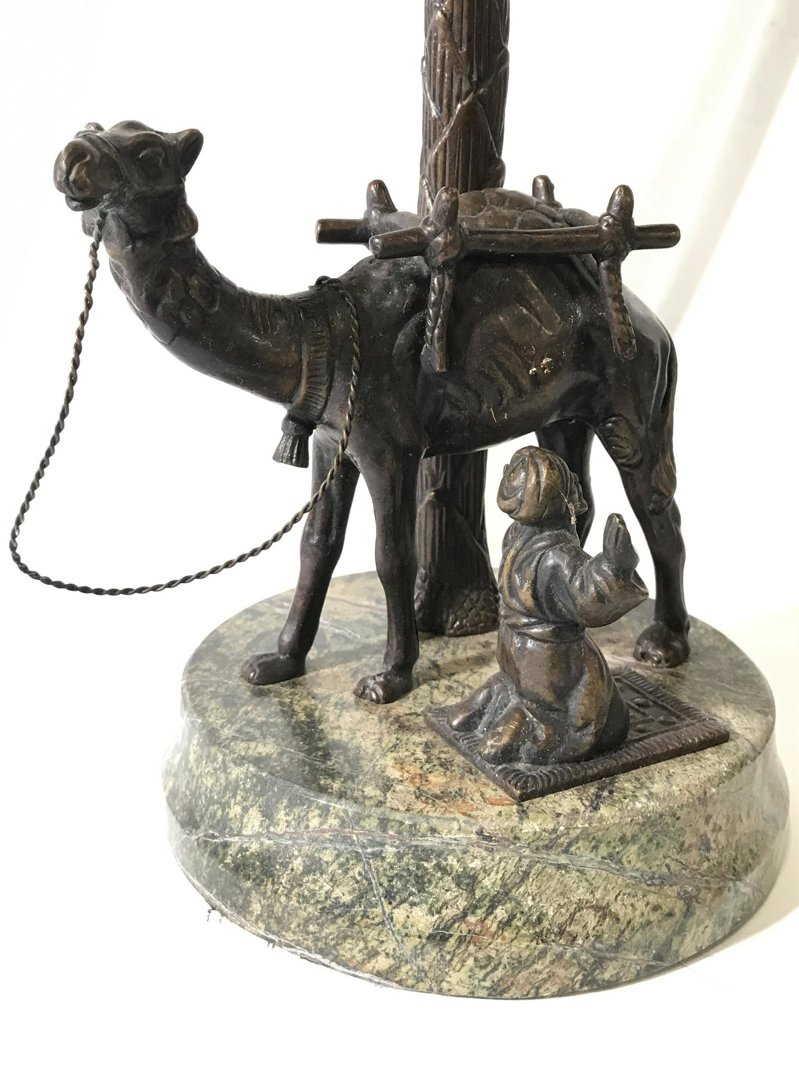 Vintage Bronze Camel Lamp W Stone Base: Base of lamp appears to be Stone, possibly marble. Piece contains praying male figure and camel figure which appear to be bronze. Lamp includes gold toned brass Figural. Piece measures approximately 2