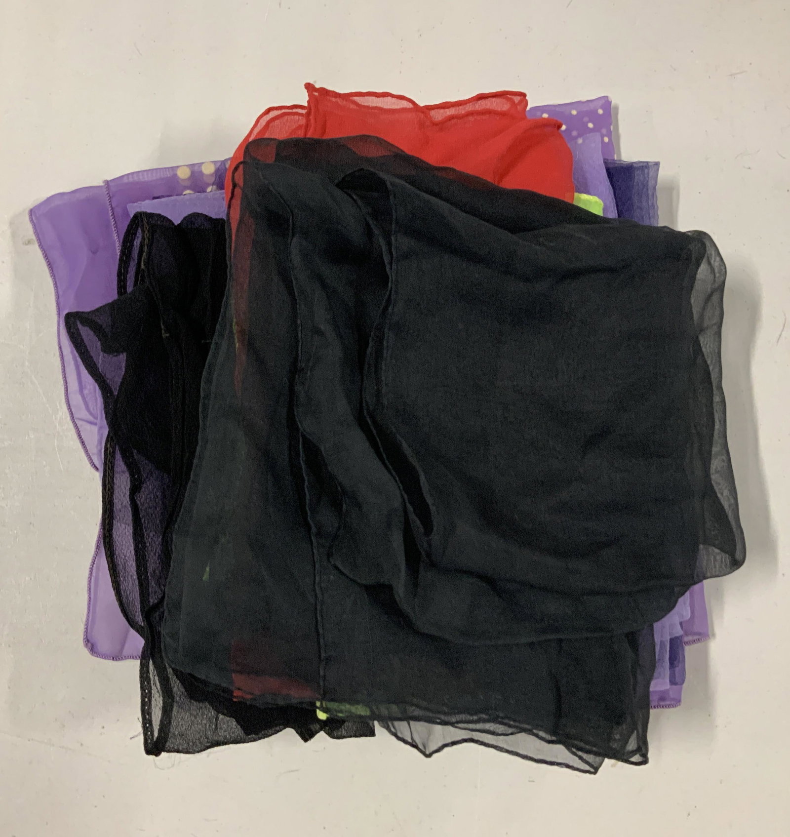 Lot 7 Handkerchiefs and Scarves: Lot 7 Handkerchiefs and Scarves, label to light purple fabric reads ‘100% nylon made in japan rn 14750’, label to lime green fabric reads ‘Everrich Industries item no evc-0056-4 03/20/13 lot no 