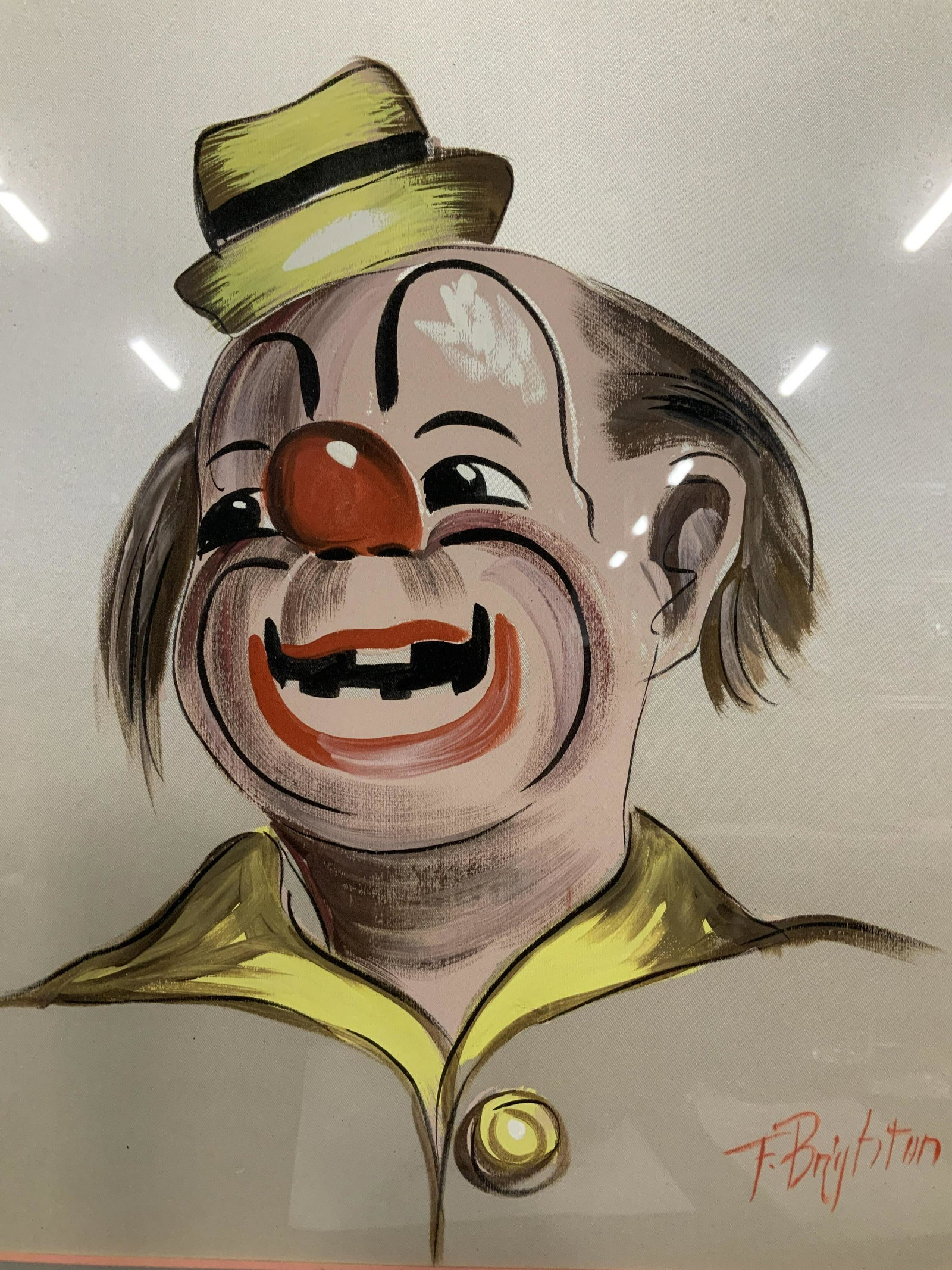 F Brighton Signed Clown Oil Painting: F Brighton Signed Clown Oil on satin Painting, Signature to lower right reads ‘F Brighton’, stamp to reverse reads ‘hand painting on satin’, subject a smiling clown, measures 21 3/4 x 18 5/8 i