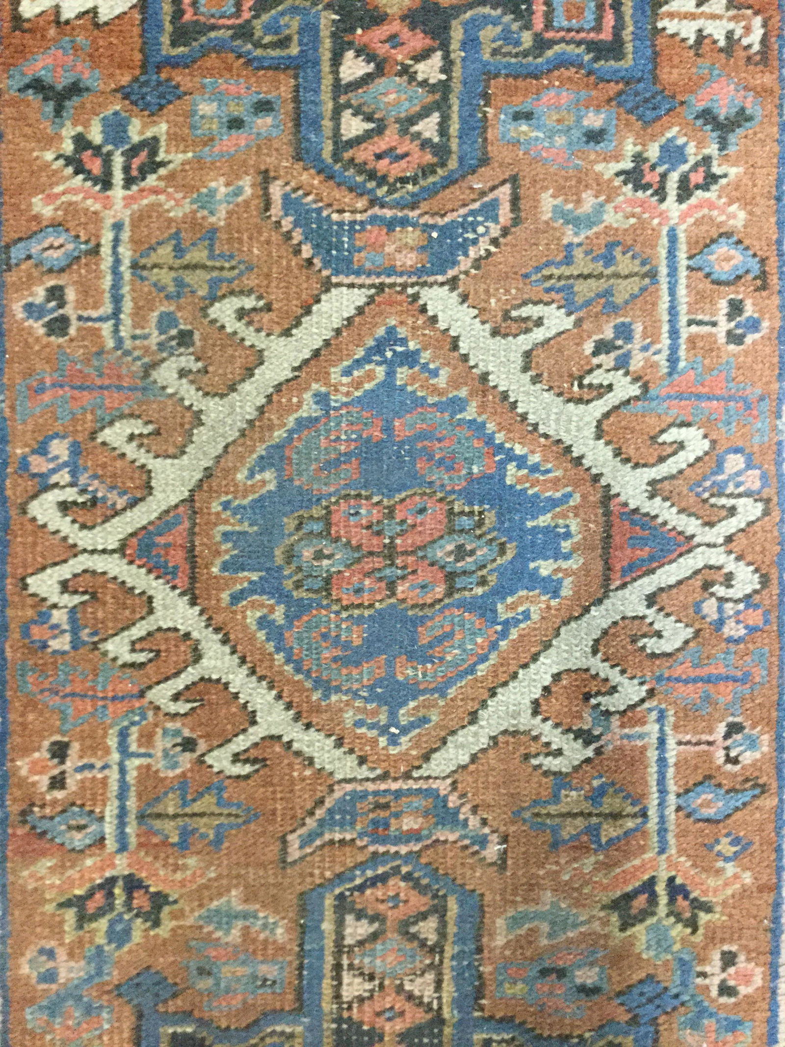 Antique Persian Handmade Wool Rug: Rug is wool and handmade. Piece appears to be antique. Rug contains intricate multi toned floral, and geometric detail. Measures approx 51 inches long 34 inches wide. Rug, carpet, area rug, wool rug,