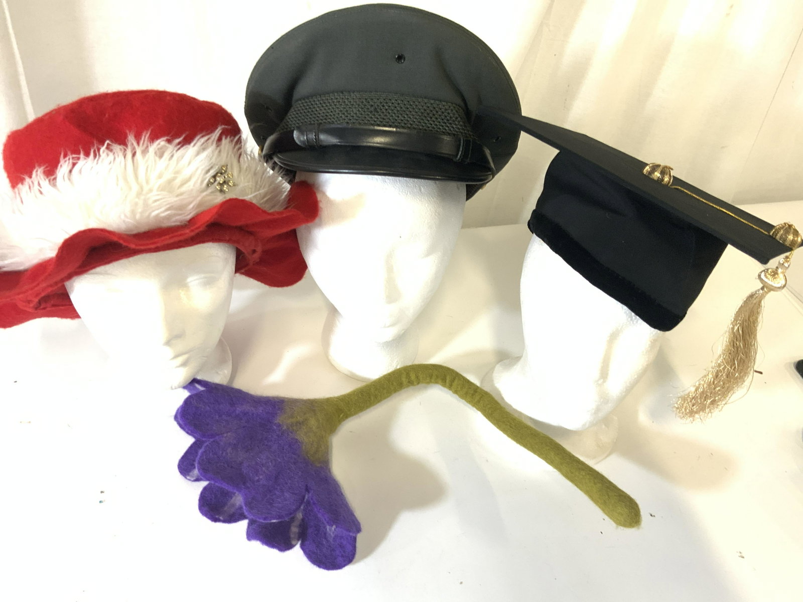 Lot 4 Vintage Costume Hats and Decor: college/ University Graduation Cap & tassel. Green Wool Military/ police/Uniform Hat. Hand made and hand sewn Red Felt Elf/ Christmas/Costume Hat w/ white Faux fur and vintage Art Deco pin. Wool Felte